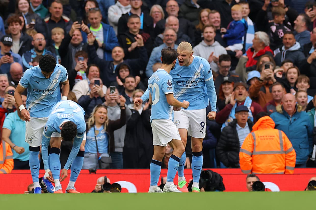 Man City close gap on Arsenal with Brentford win