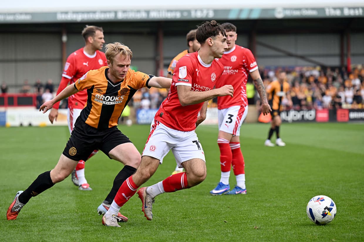 Cambridge secure League One return after goalless draw