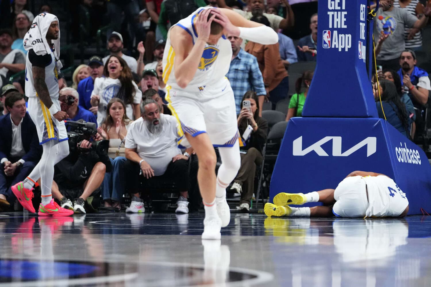 Warriors win in OT, but lose Moses Moody to a serious left knee injury