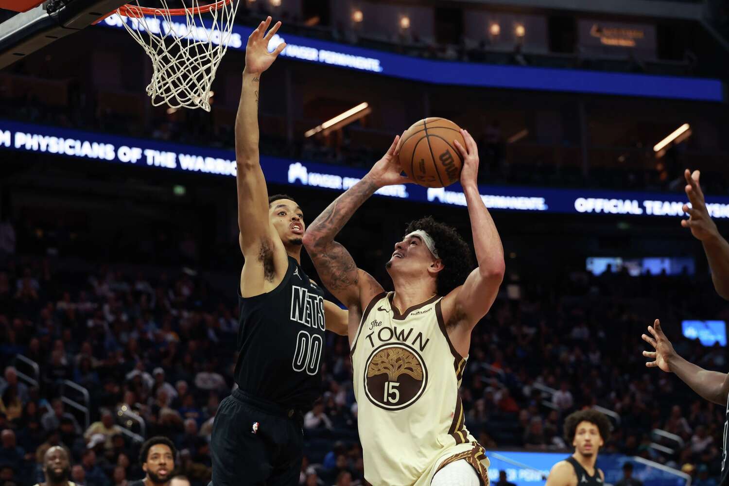 Warriors, with play-in spot assured, ride Gui Santos' 31-point outing to win over Nets