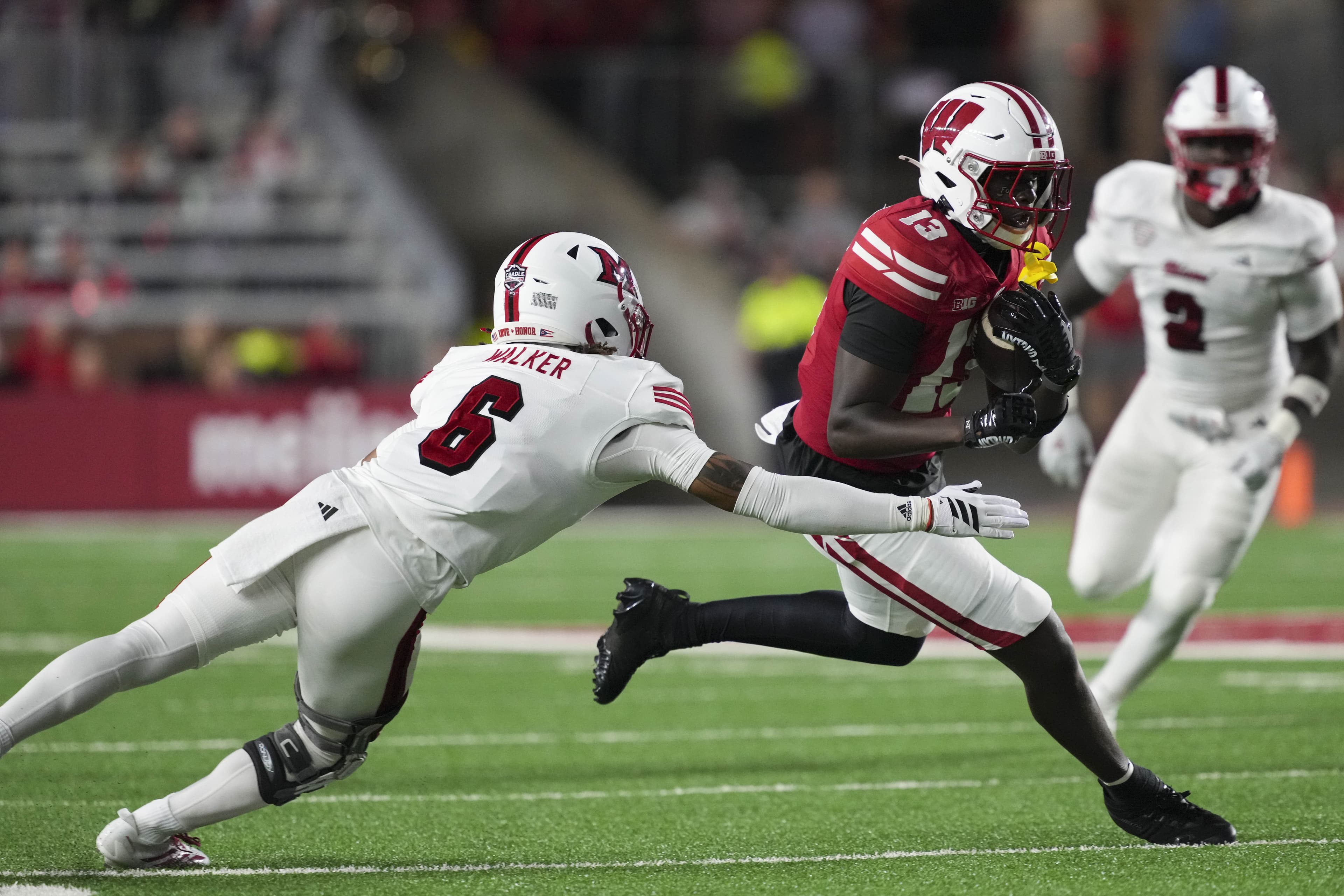 Badgers looking to flip four star WR commit, set official visit