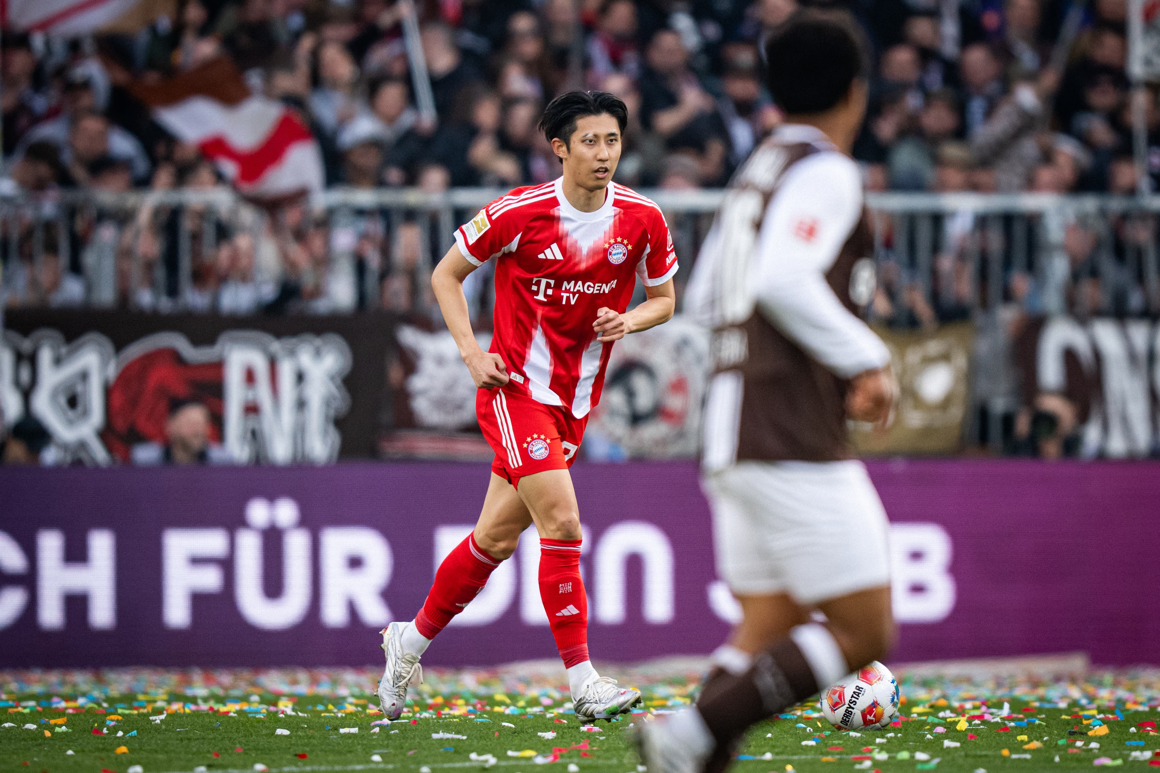 Bayern Munich’s Hiroki Itō motions to be taken off vs. St. Pauli