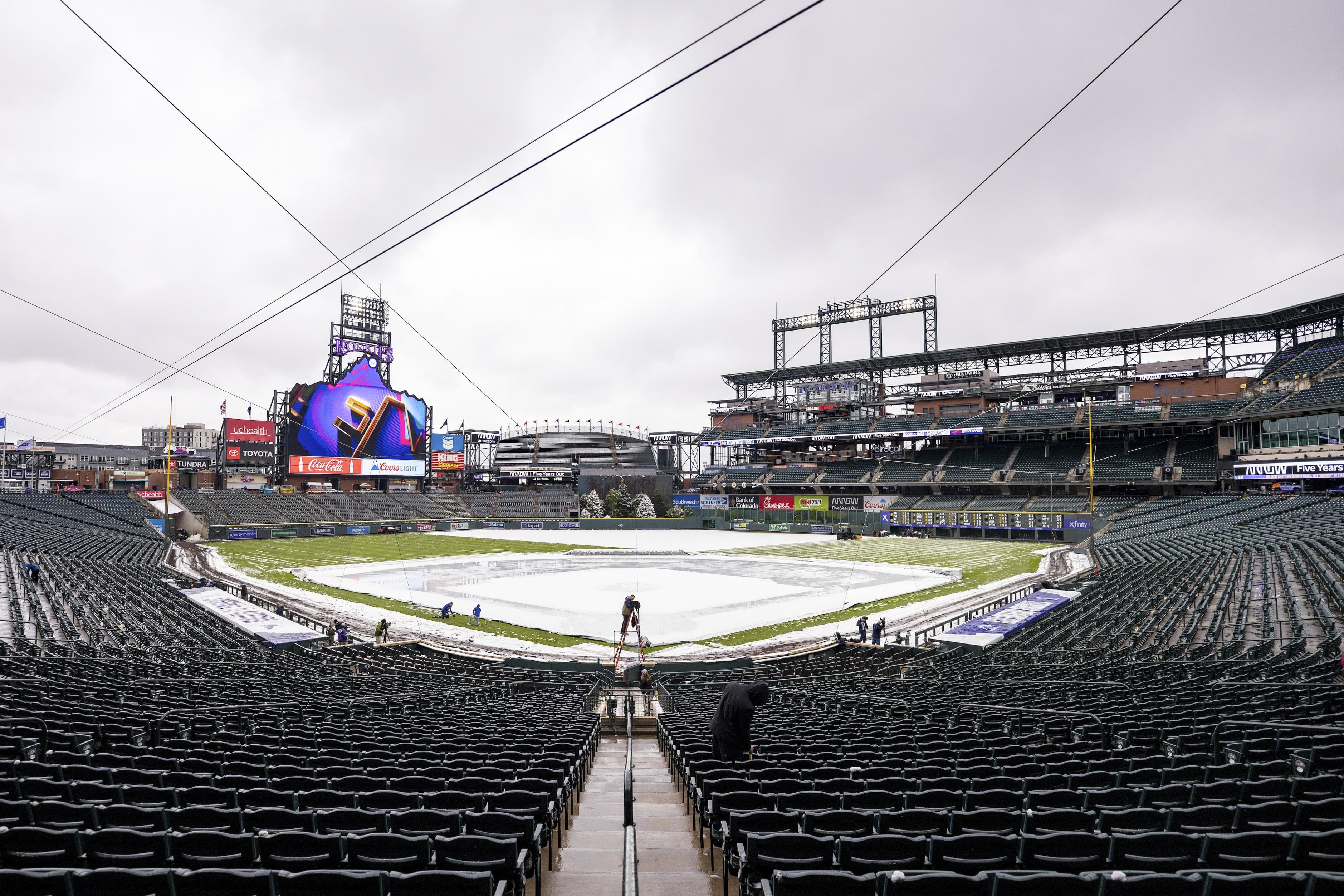 Mets visit Rockies for three as weather looks dicey