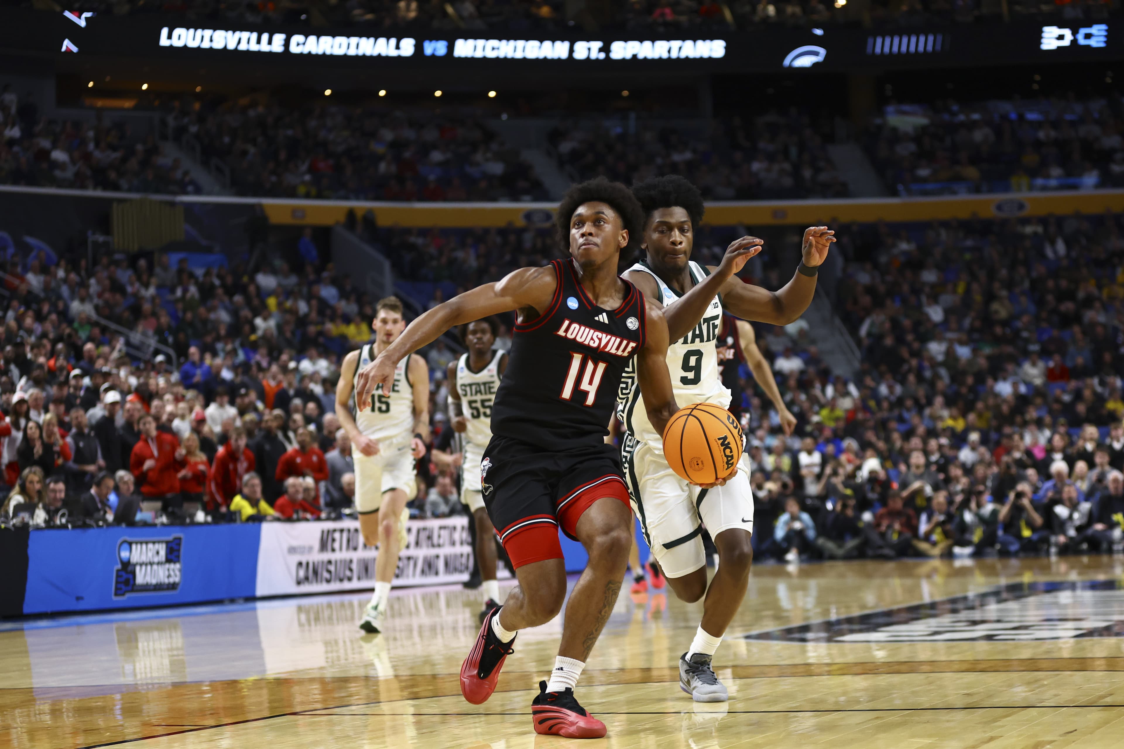 Adrian Wooley returning to Louisville