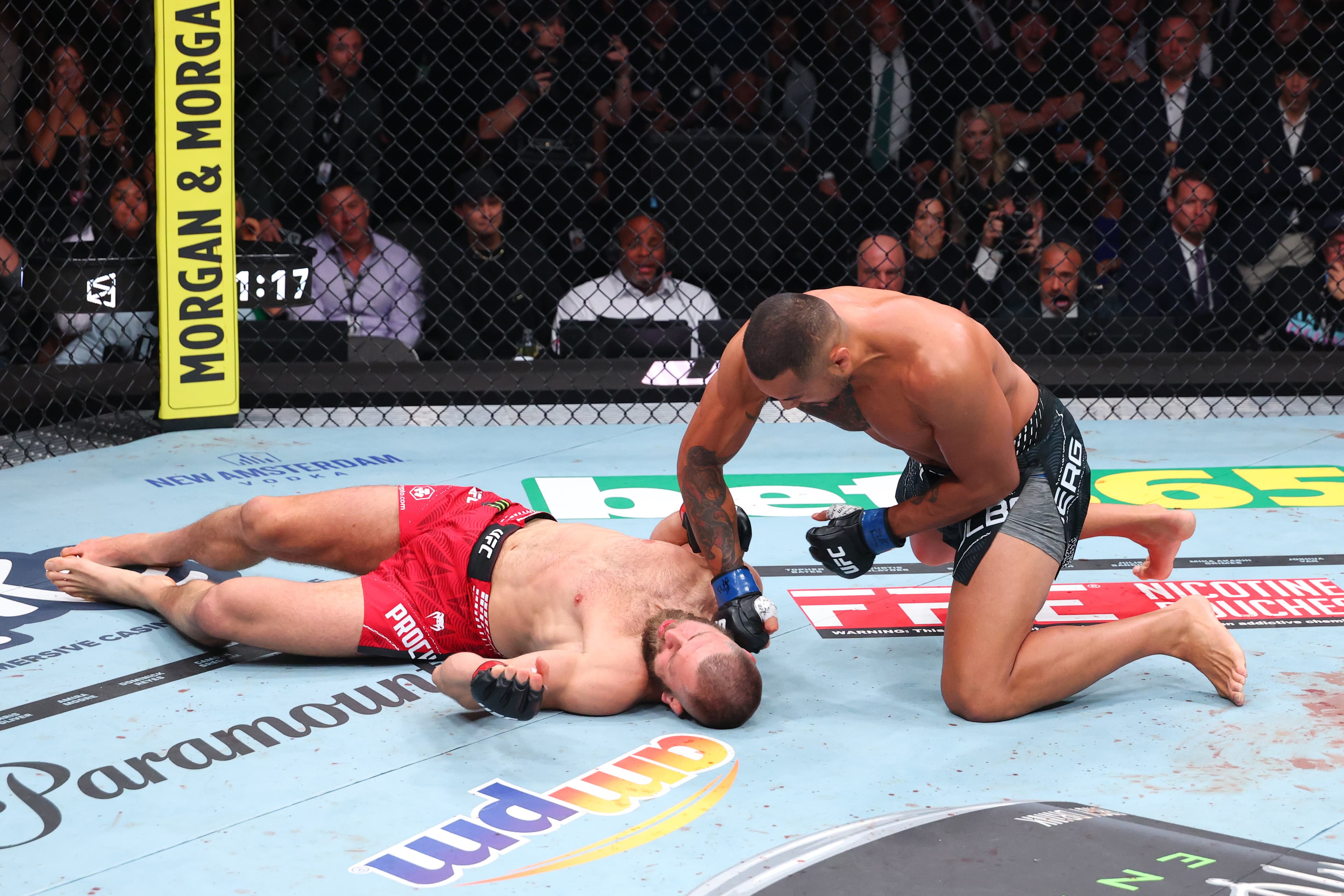 Carlos Ulberg blows out his knee, still delivers brutal knockout to beat Jiri Prochazka and win title in UFC 327 main event