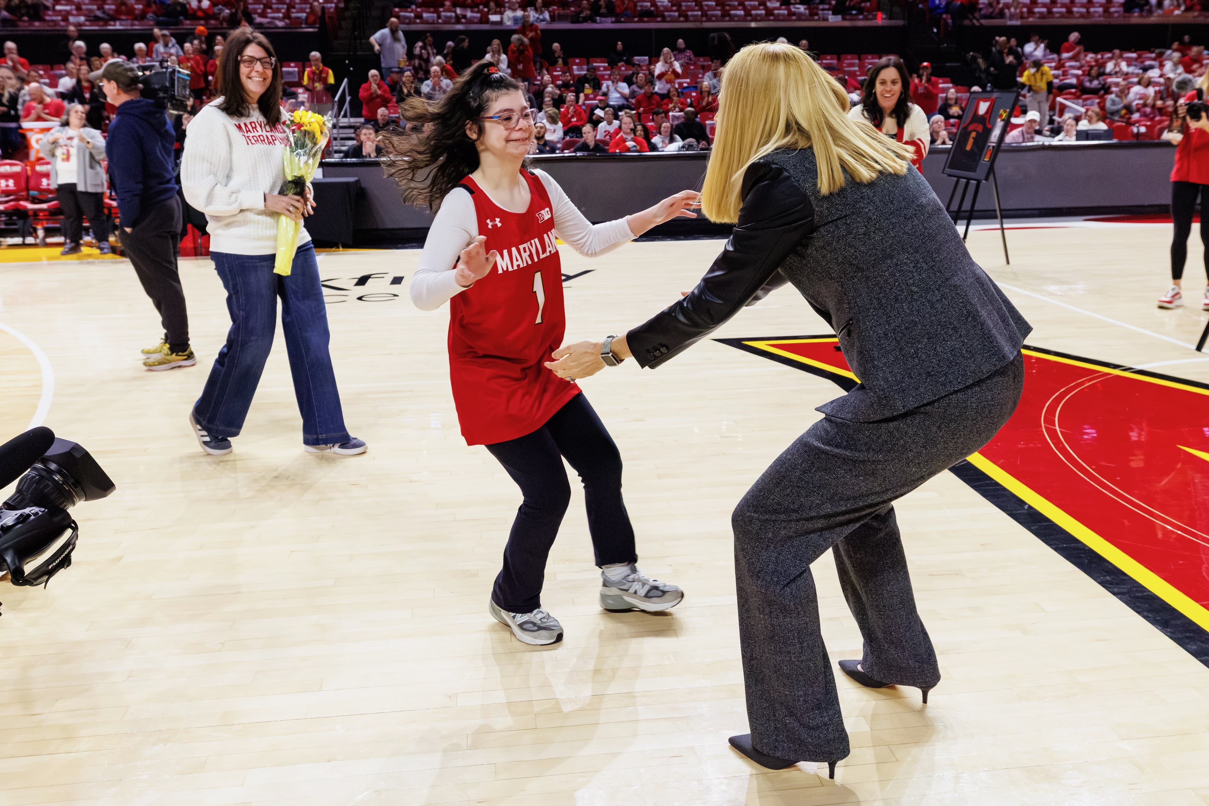 Maryland women’s basketball’s “16th player” creates an unforgettable bond