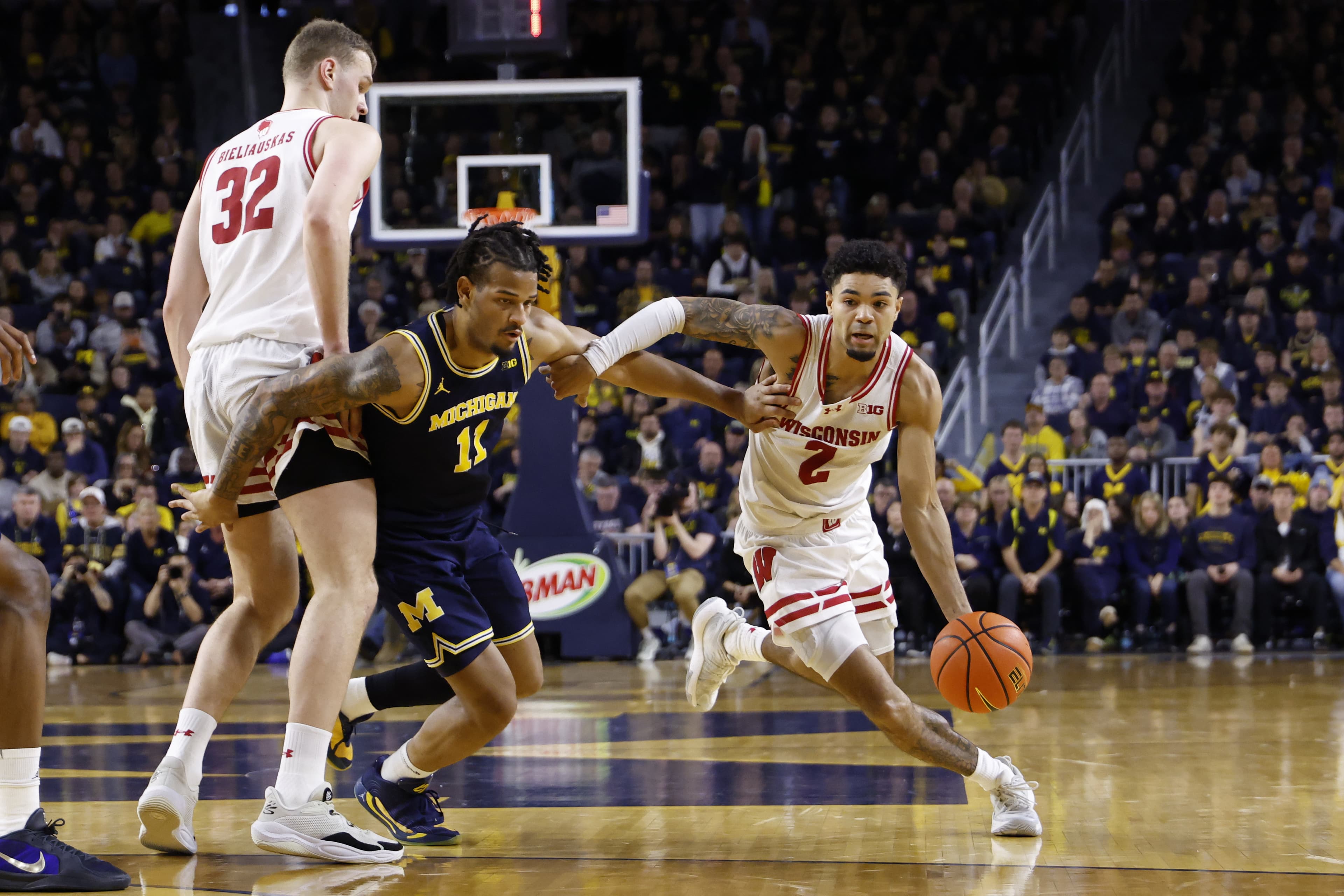 Wisconsin's Assault Sees Big Ten Contender Title Challenges; Michigan to Shatter Pack in State Final!