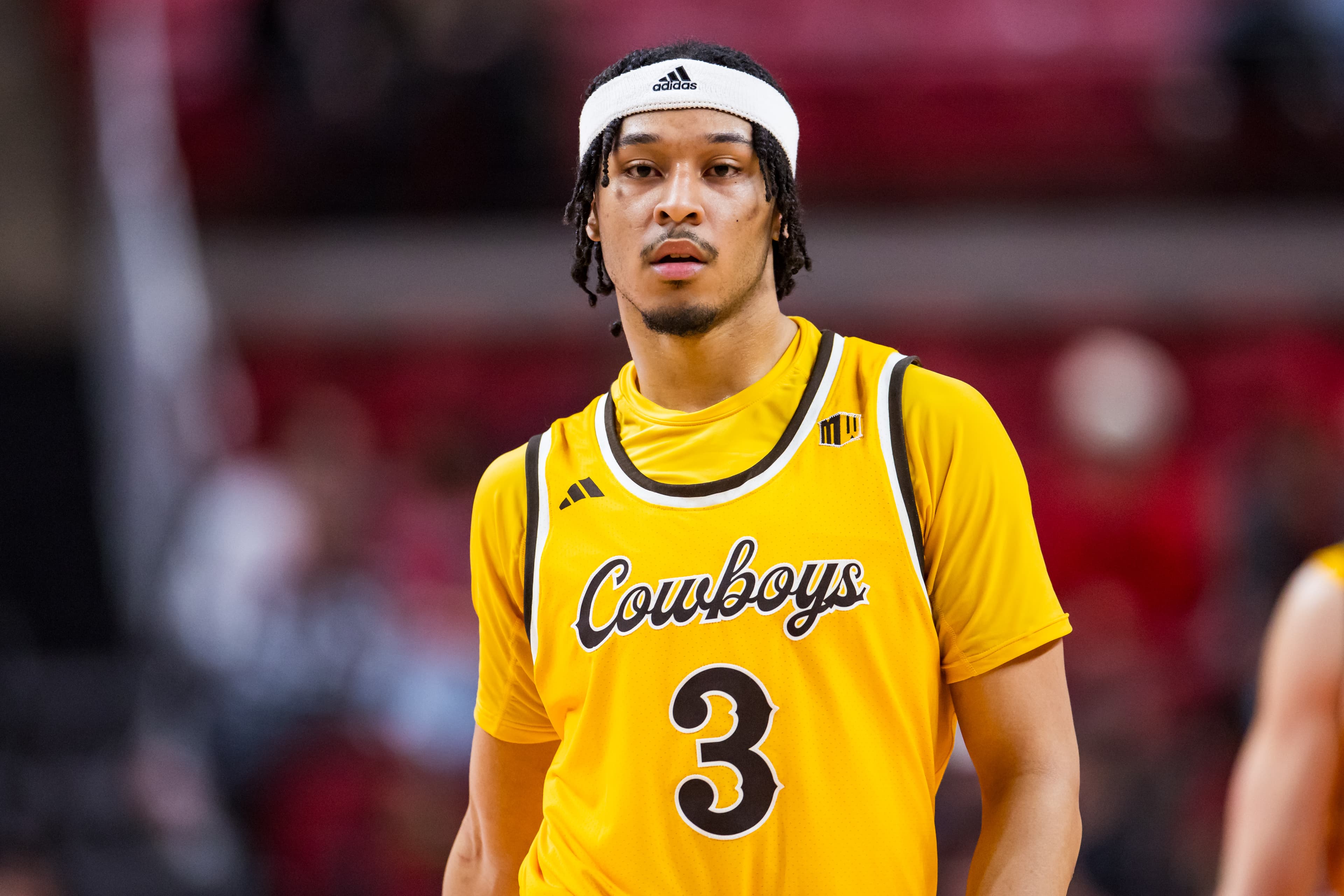 **Headline:** "Thundering Wyoming vs. Shockingly Strong Wichita State in Elite 8 Playoffs!