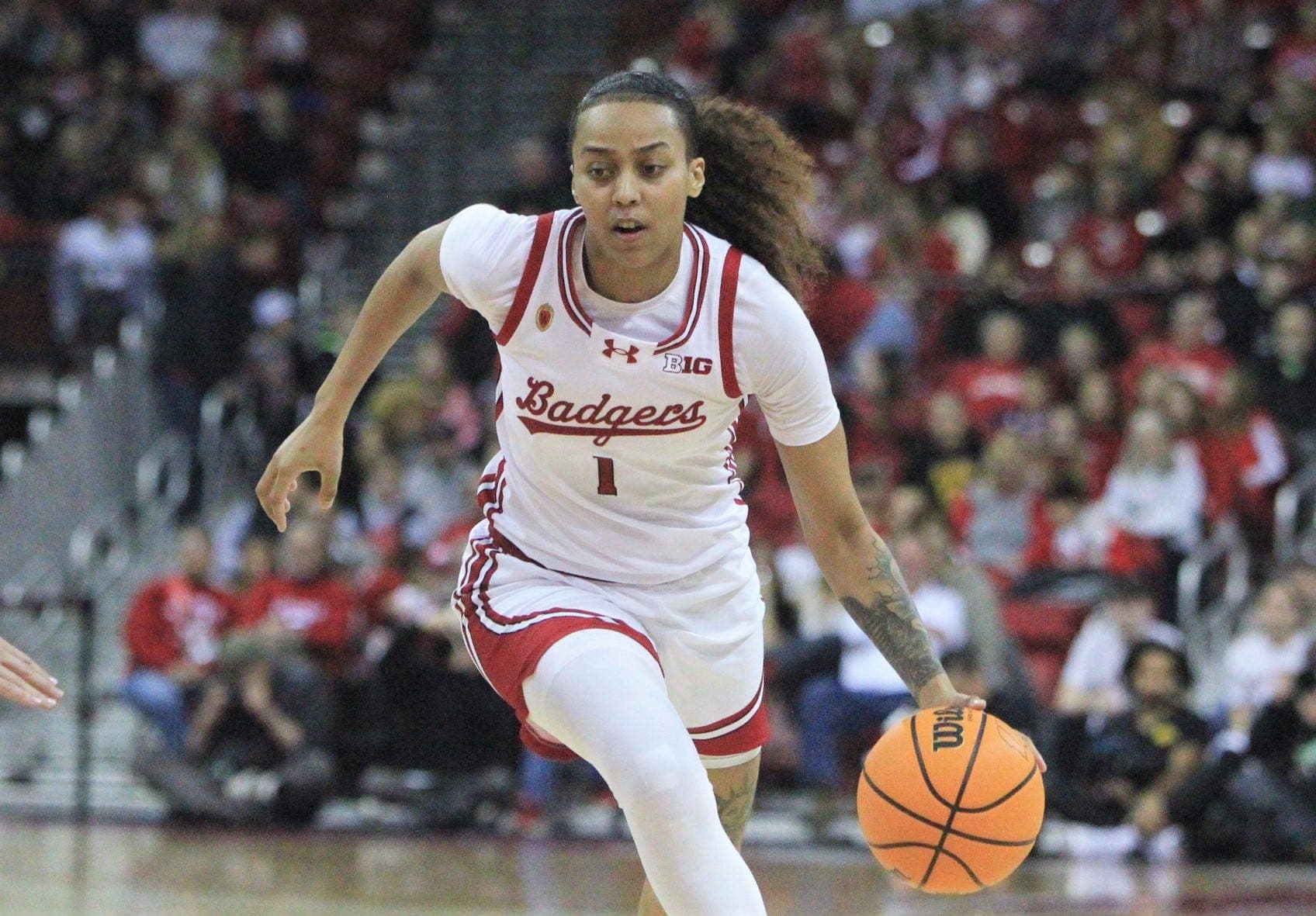 Badgers beat Harvard in overtime thriller, inch closer to WBIT Championship