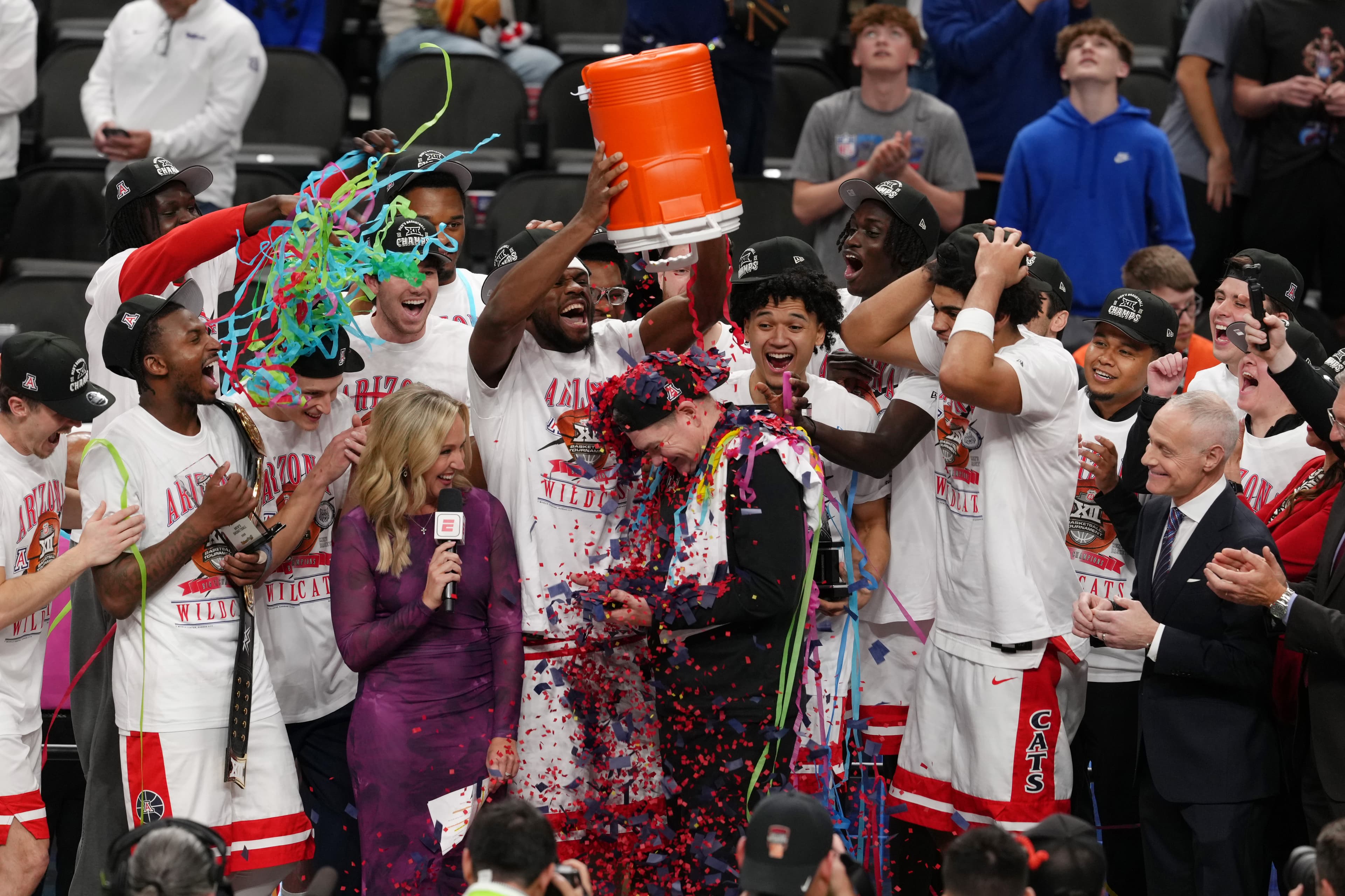 New Headline: Wildcats Charge Forward; Elite Champs Climb to Championship Stakes in NCAA Tourney