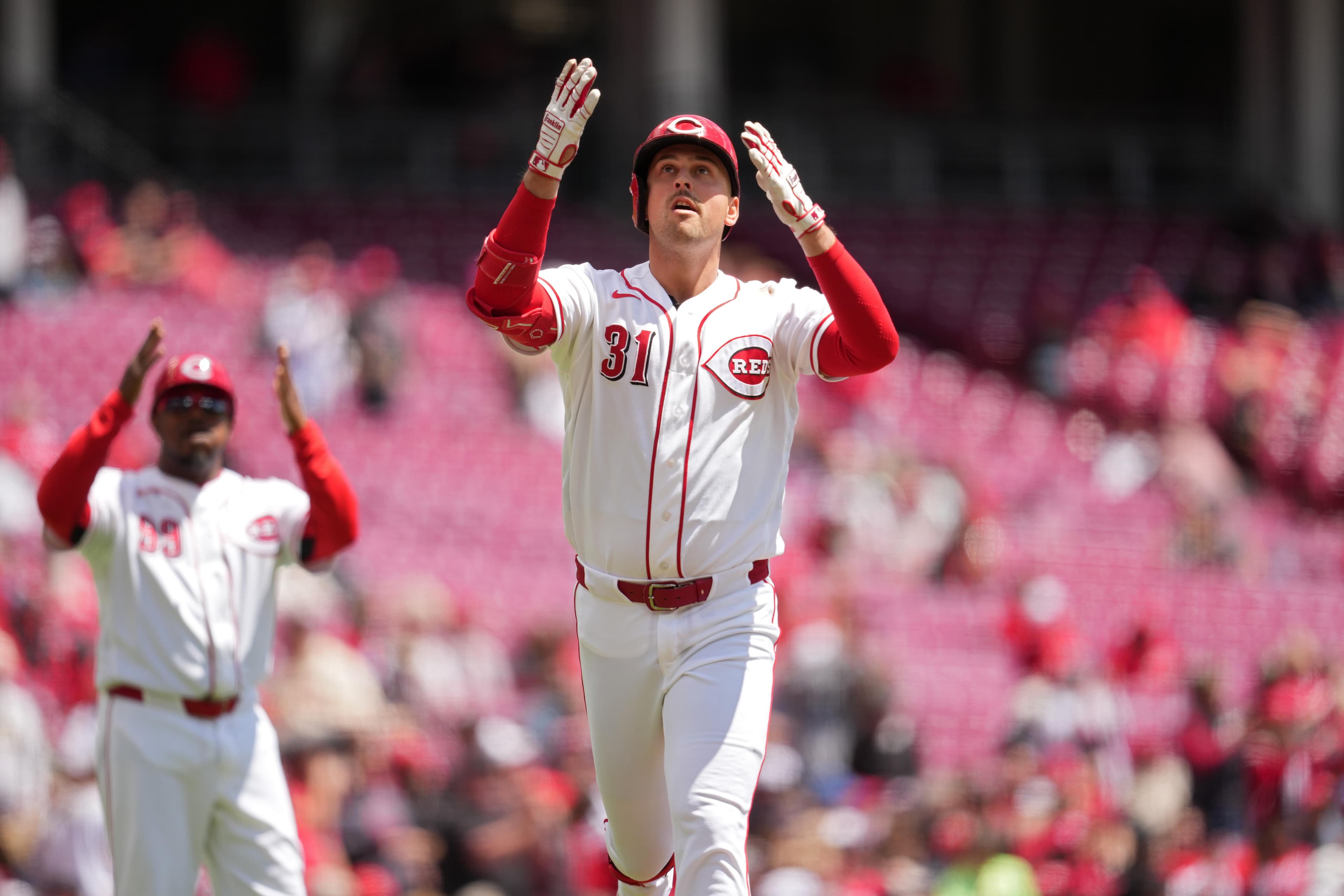 Nathaniel Lowe, TJ Friedl power Reds past Rockies