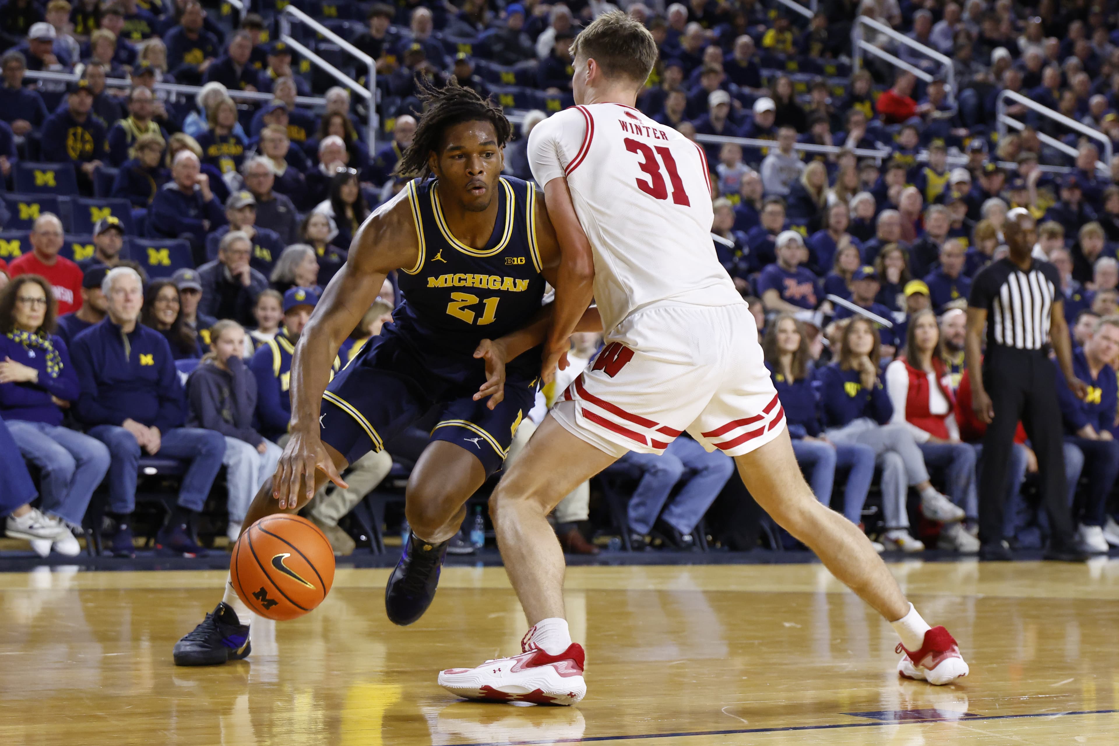 Epic Battle Brewing Up in the Big Ten Final Four: Michigan vs. Wisconsin！