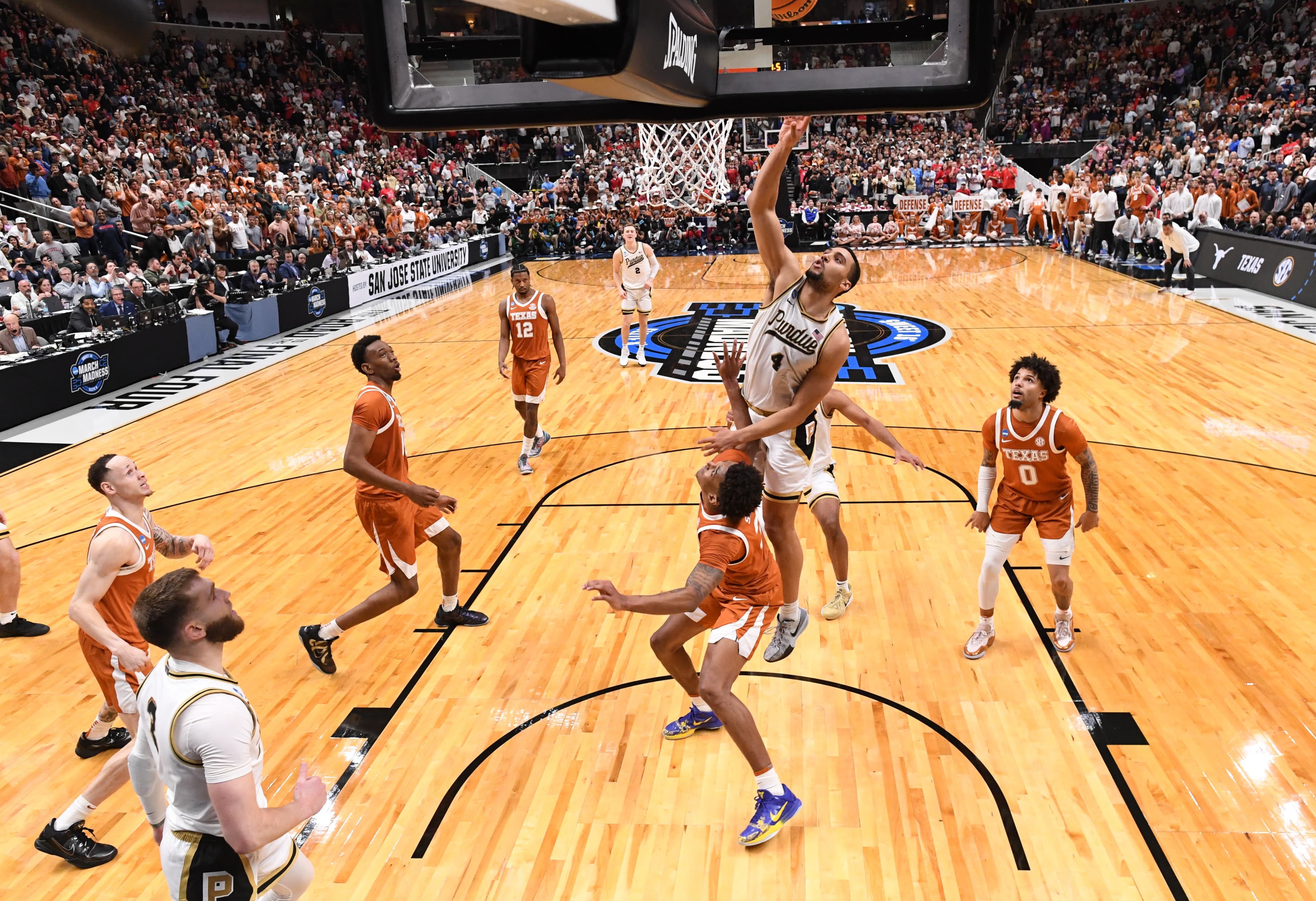 Texas loses heartbreaker on last-second tip in for 79-77 loss to Purdue