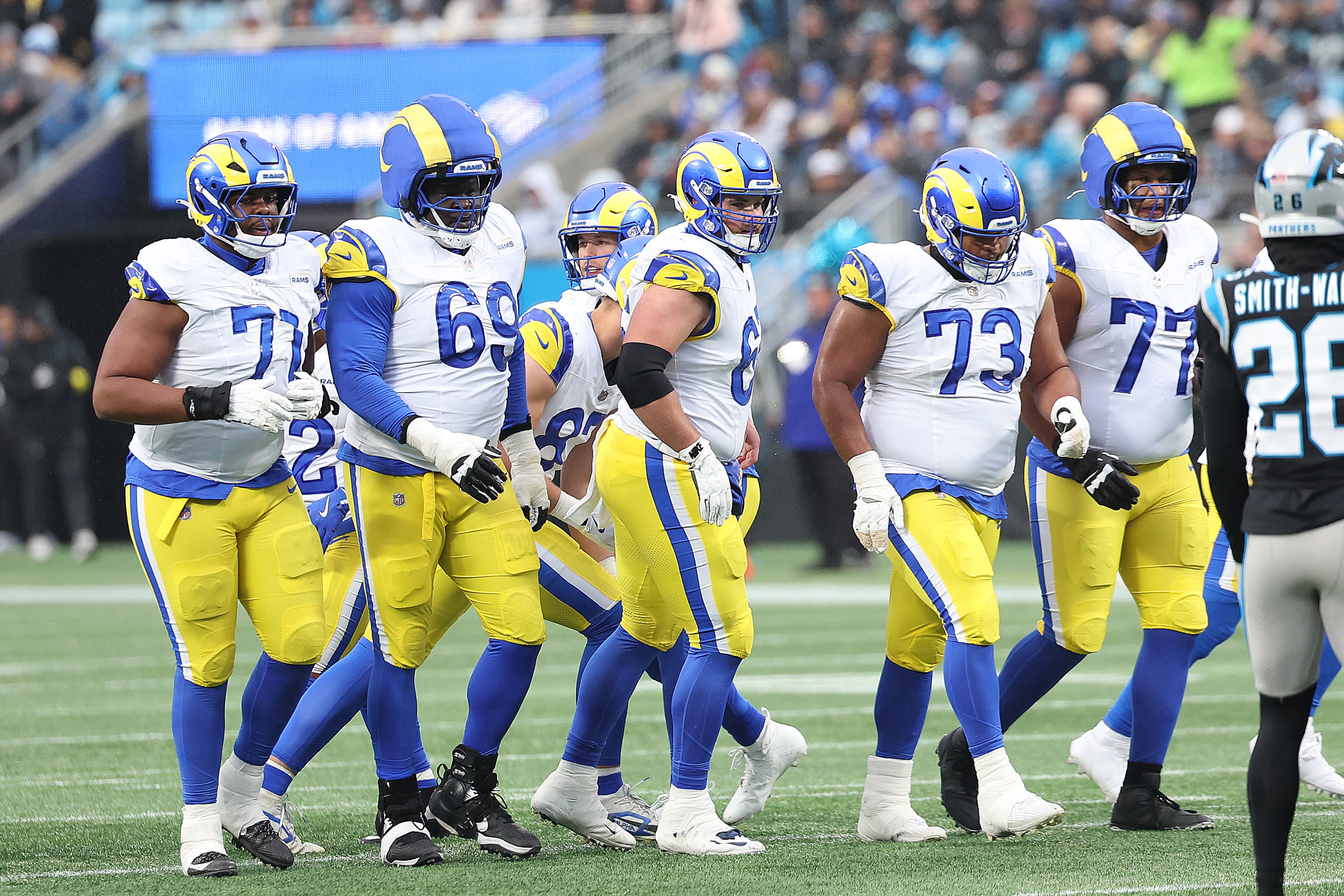 How much would it cost Rams to keep OL together long-term?
