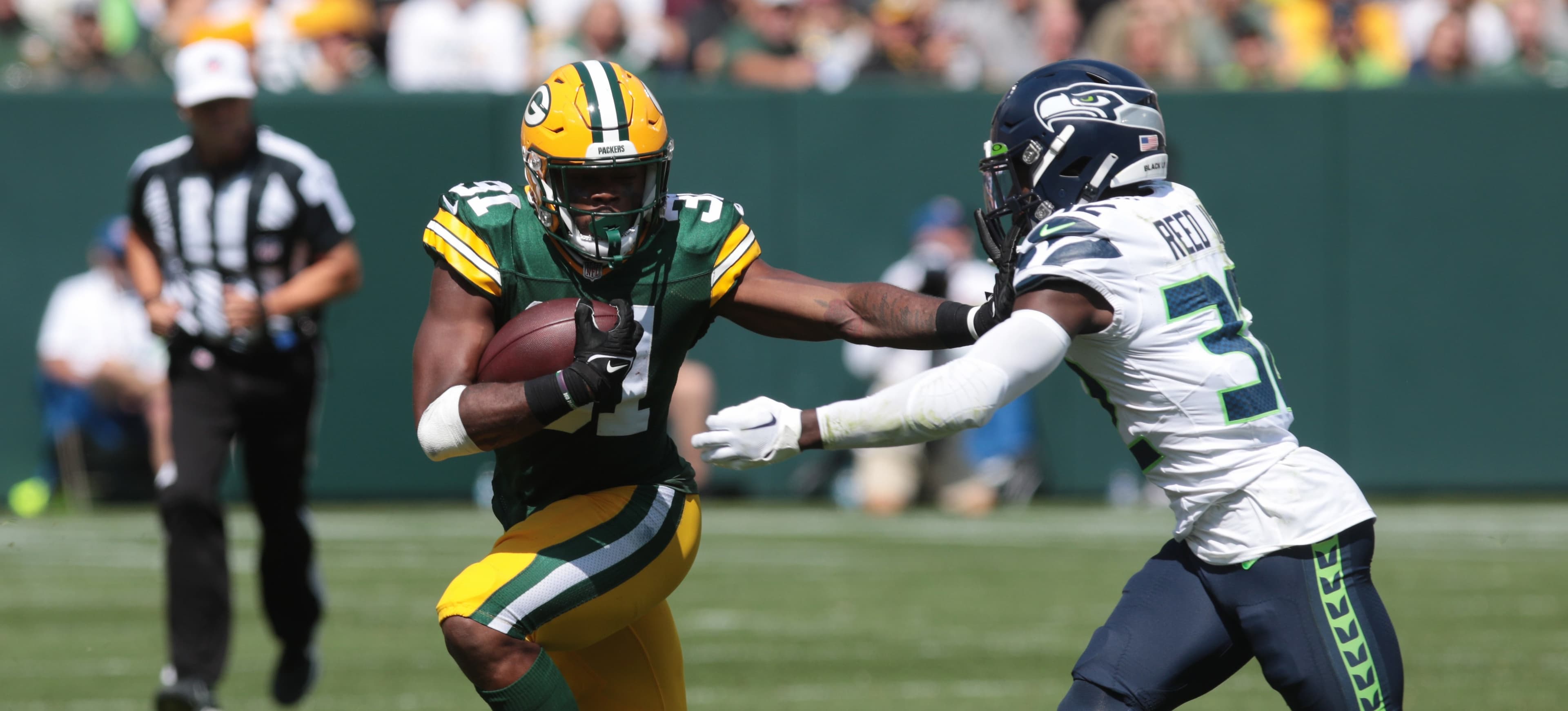 Emmanuel Wilson's Hearts Propel Seattle Seahawks to Victory Through Unwavering Faith