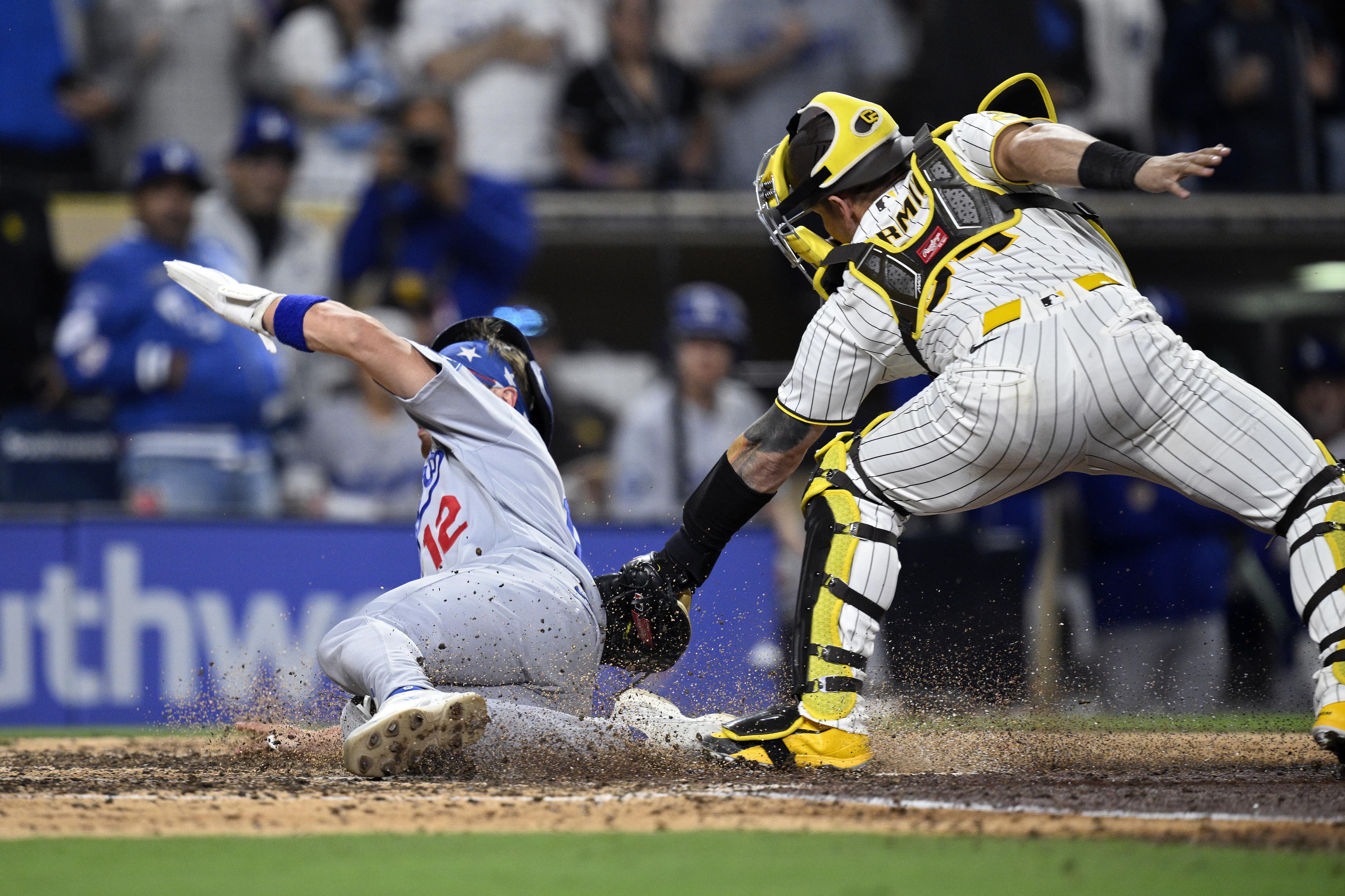 Dodgers capitalize on gift to even series with Padres
