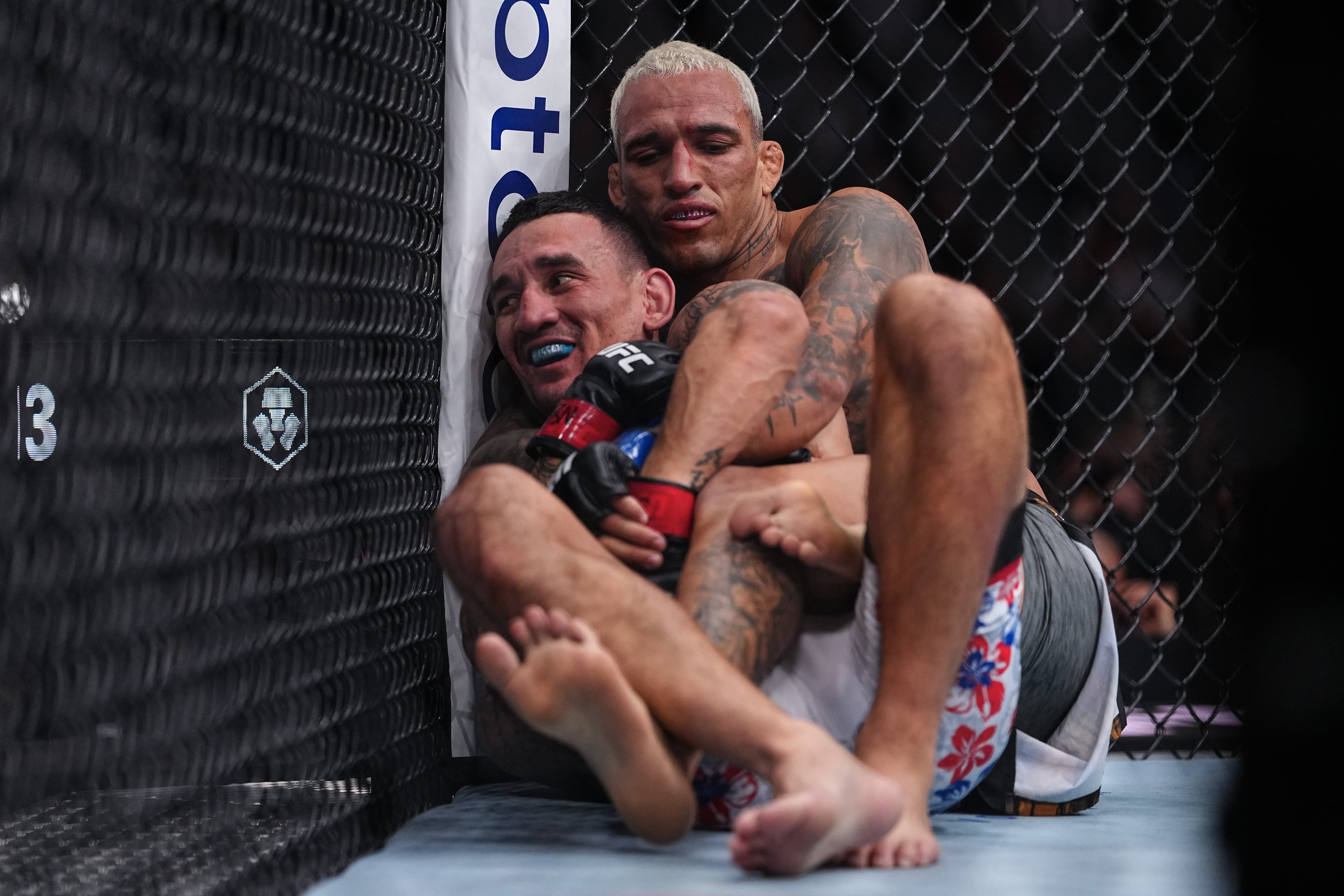 Charles Oliveira Takes Down Max Holloway in Shocking MMA Match-Up!