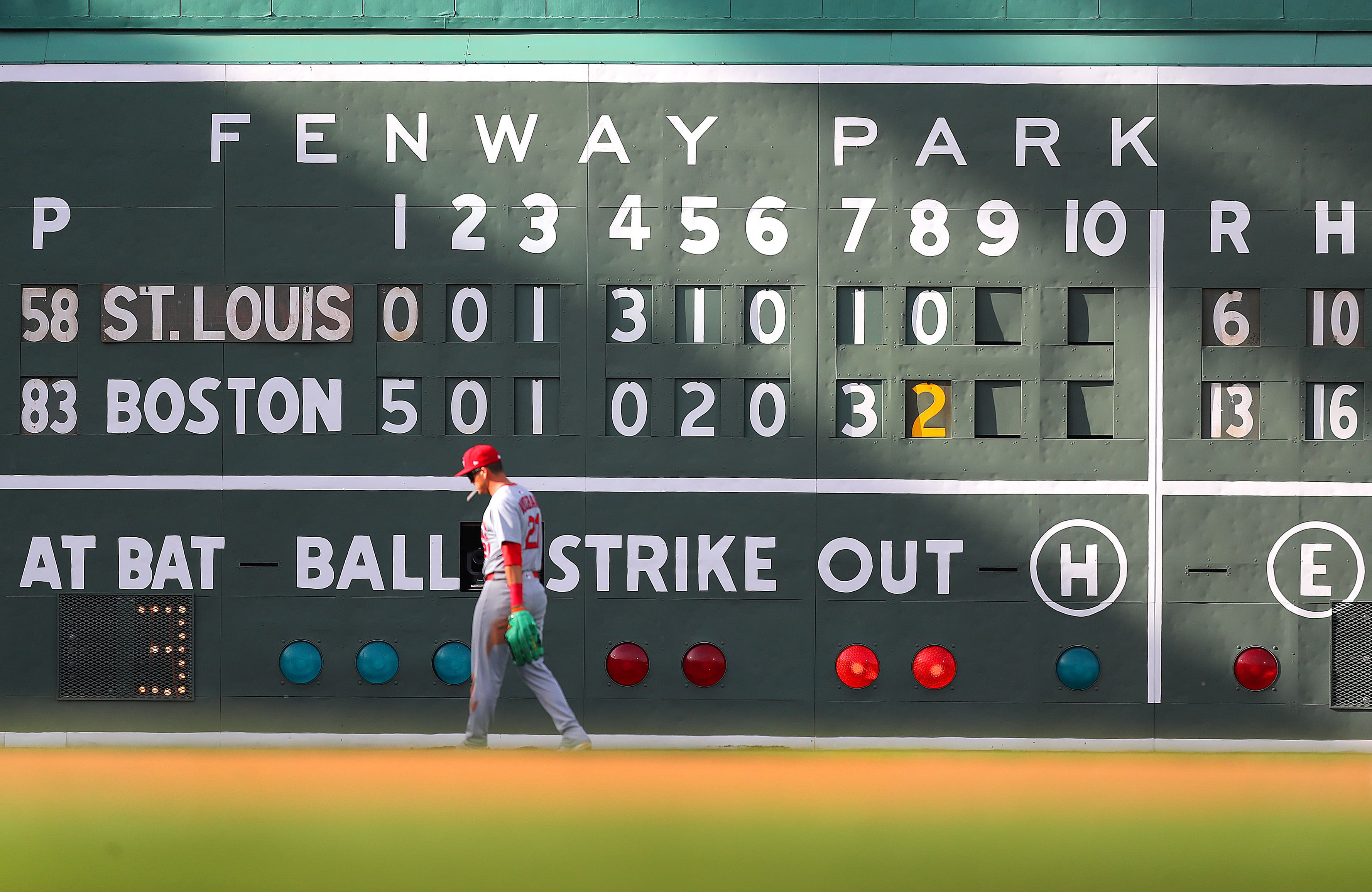Which franchise has fallen further, the Red Sox or the Cardinals?
