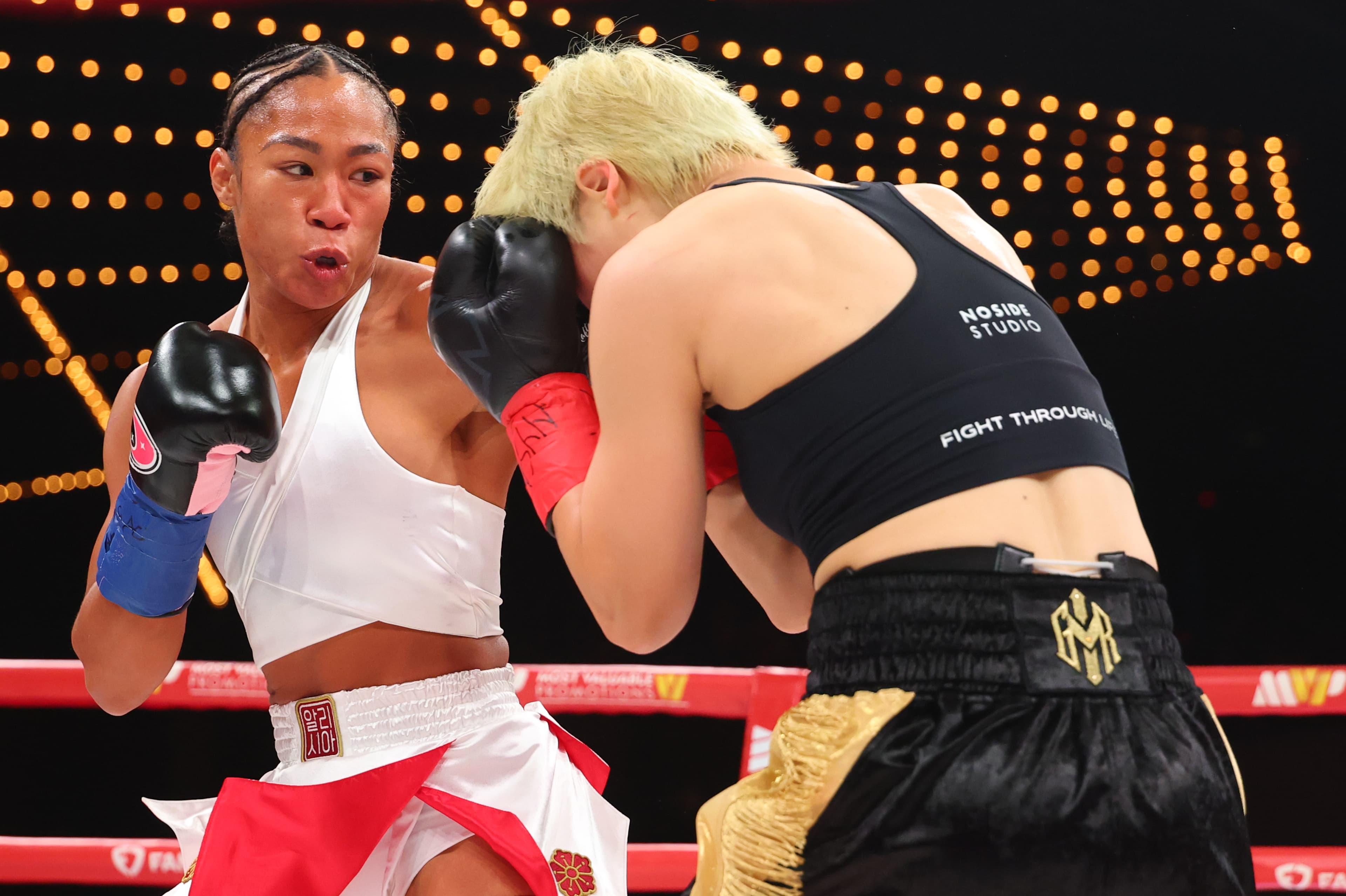 Highlights: Alycia Baumgardner retains titles, Lani Daniels upsets Shadasia Green