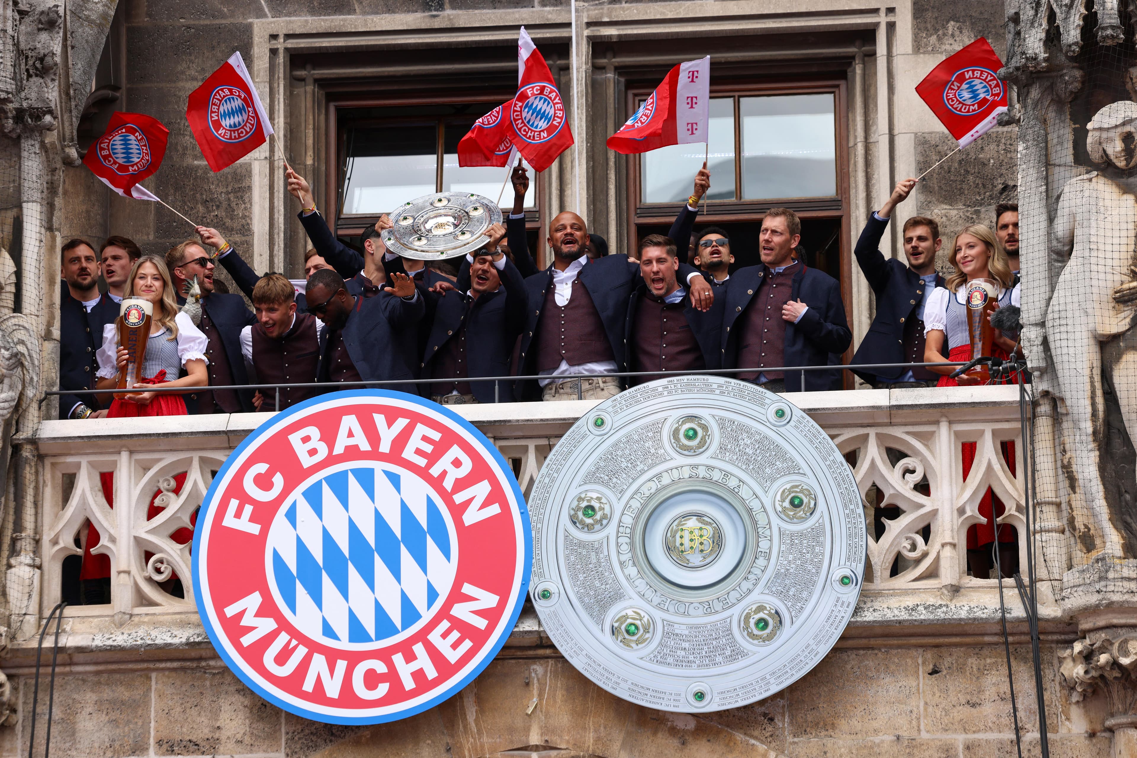1860 Munich fans insult Bayern Munich with fake club crest during trophy parade