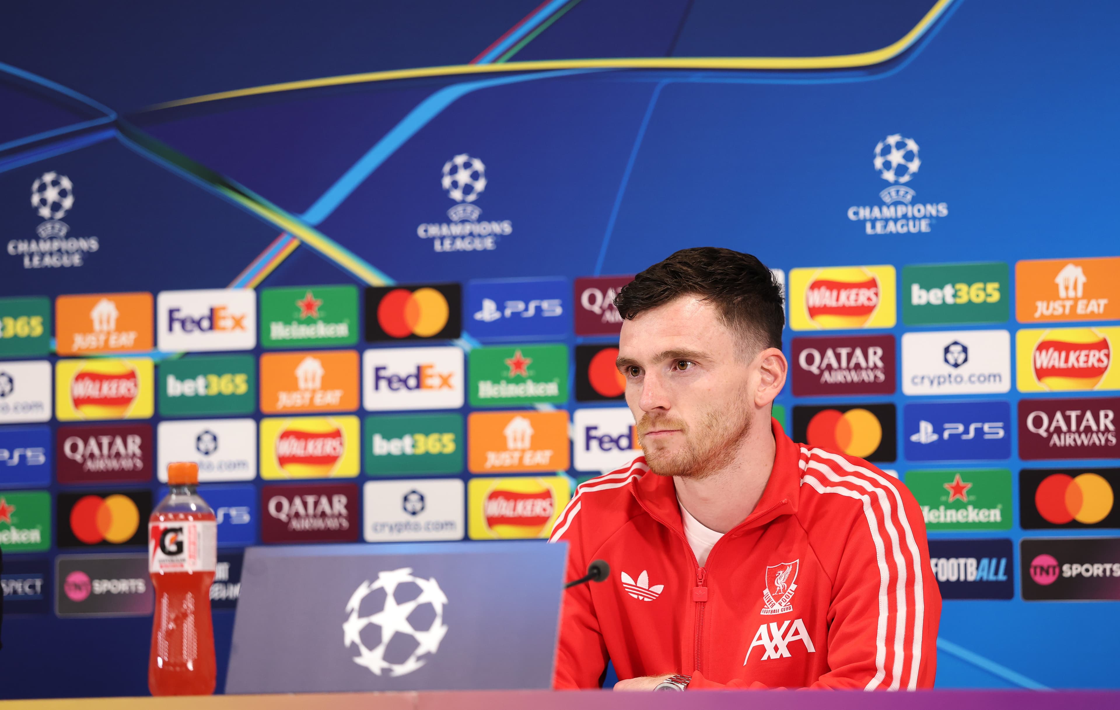 Robertson Says Liverpool Must Give Fans “Something to Get Behind”