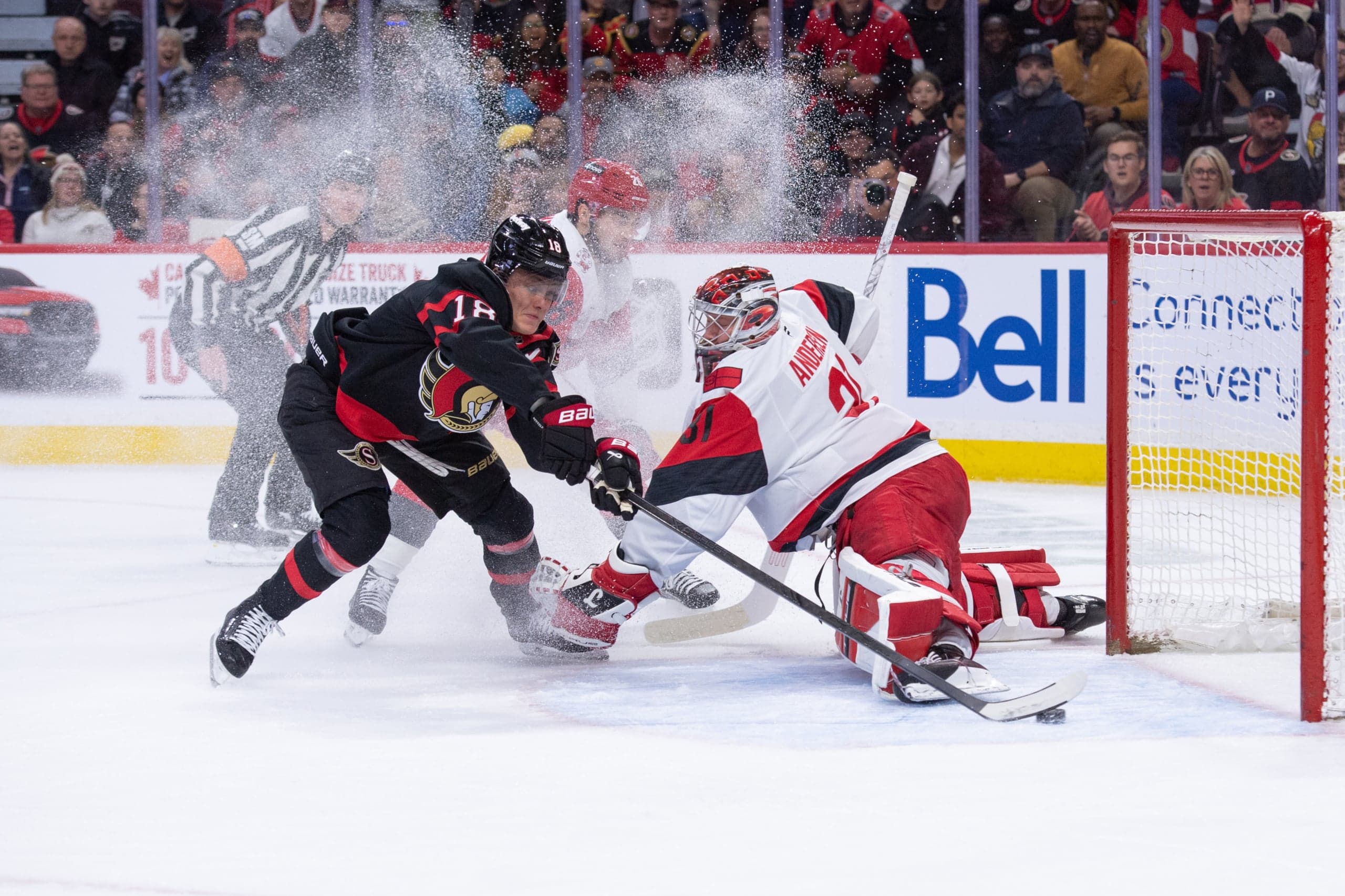 Flat Hurricanes Lose to Hungry Senators; Taylor Hall Hits Milestone