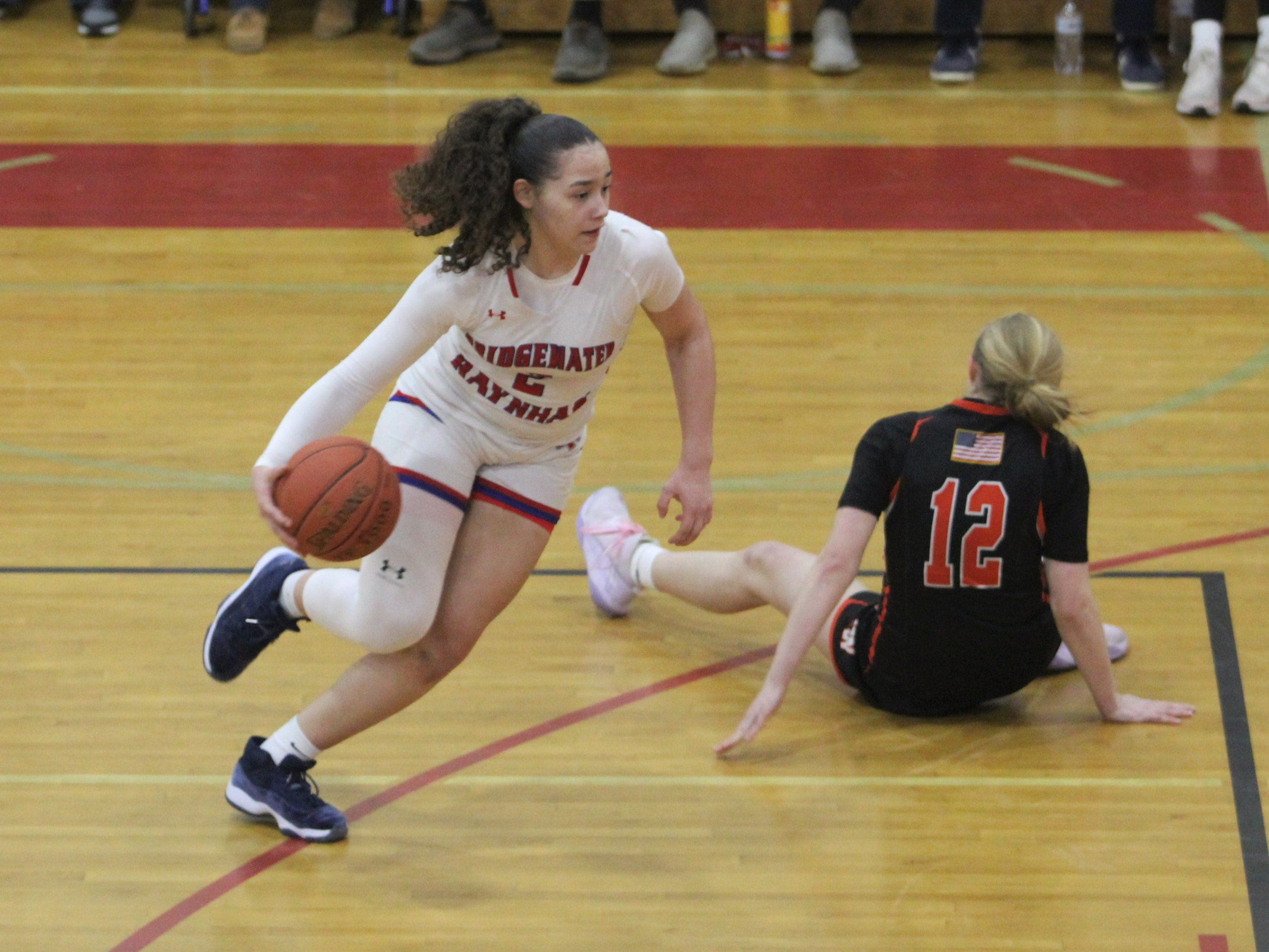 A former B-R girls basketball star is headed back to the Bay State