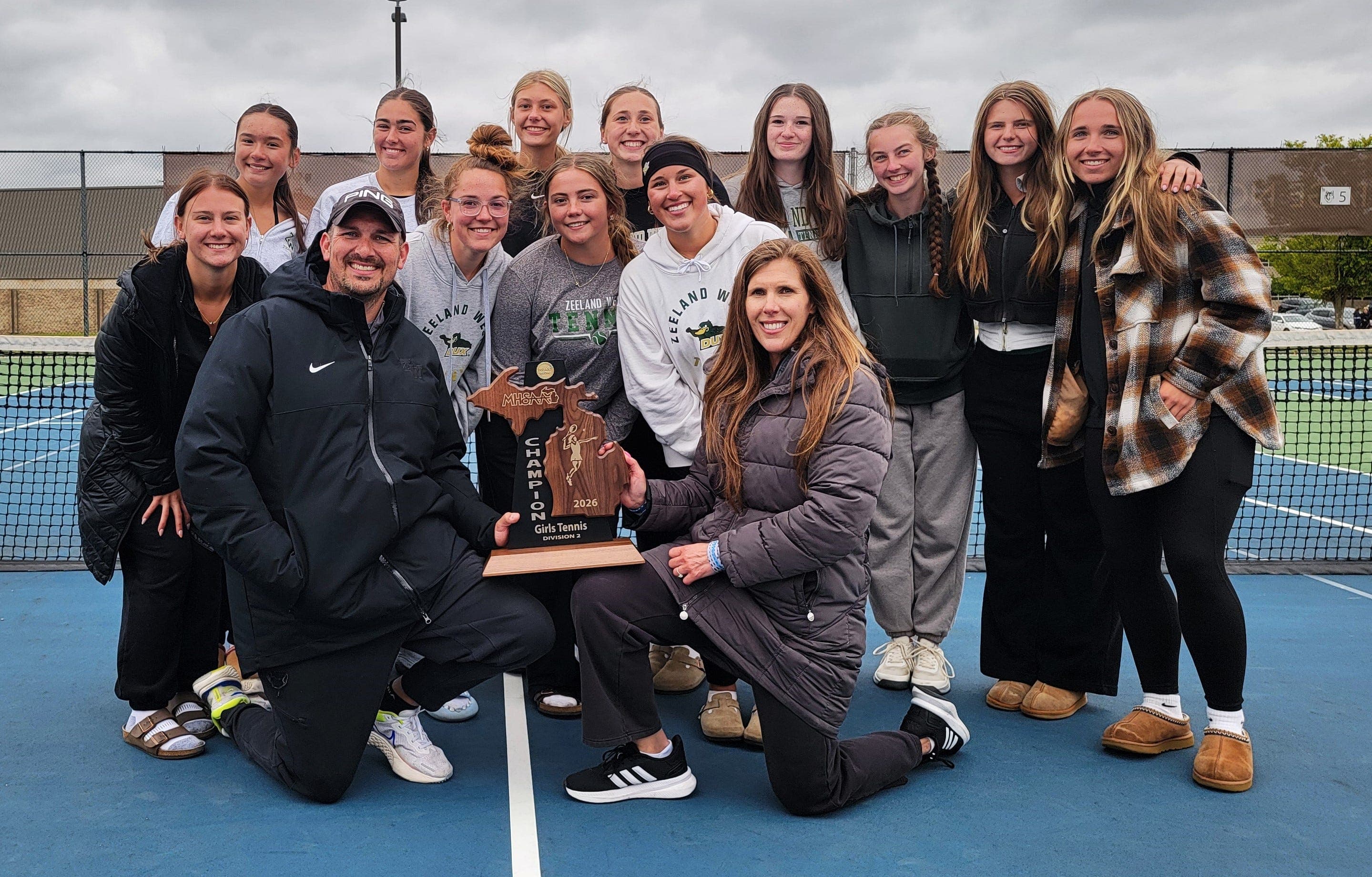 Zeeland West claims first ever girls tennis regional title in thrilling fashion
