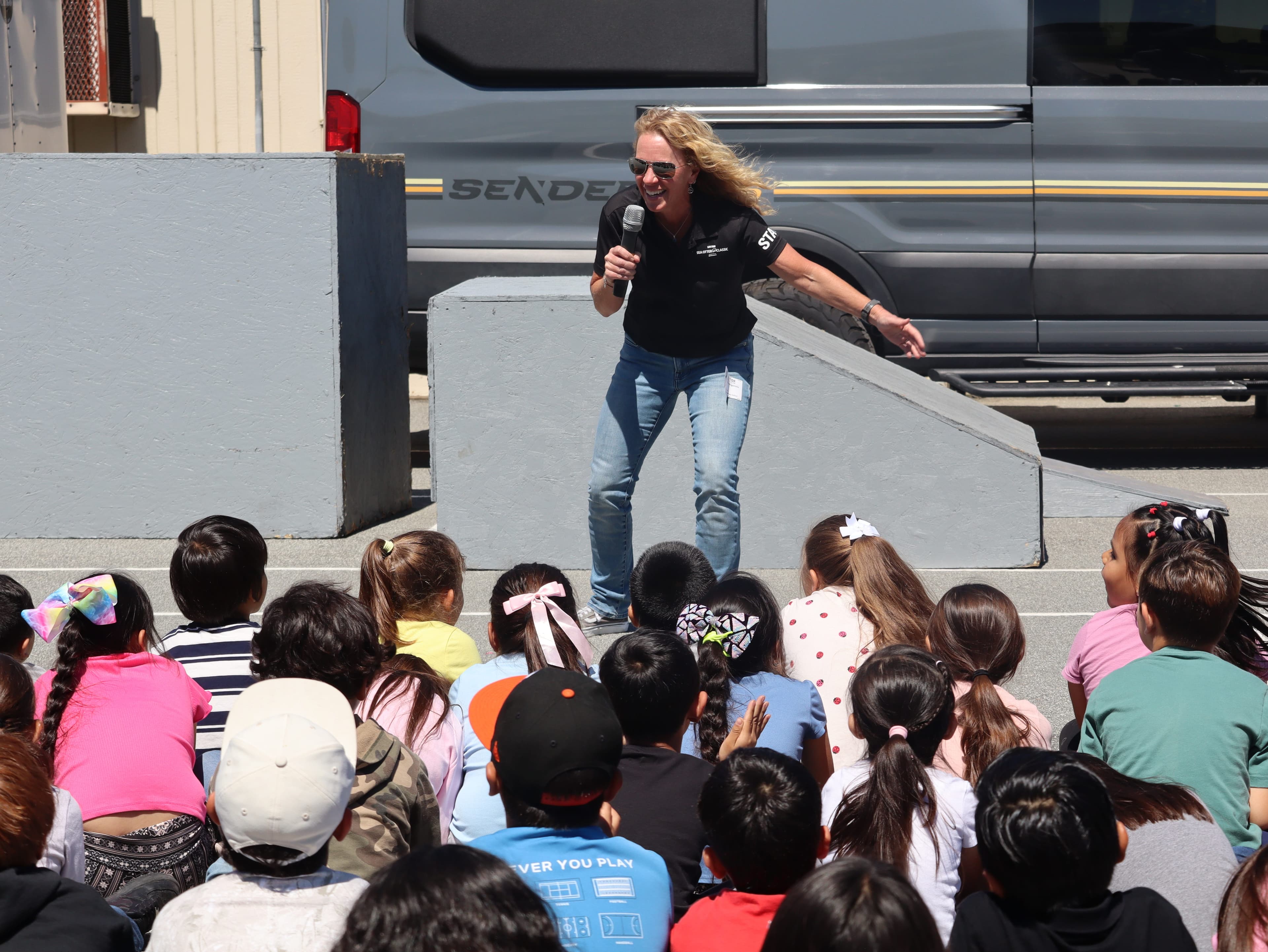Cycling pro wows kids with bike tricks at Salinas elementary school
