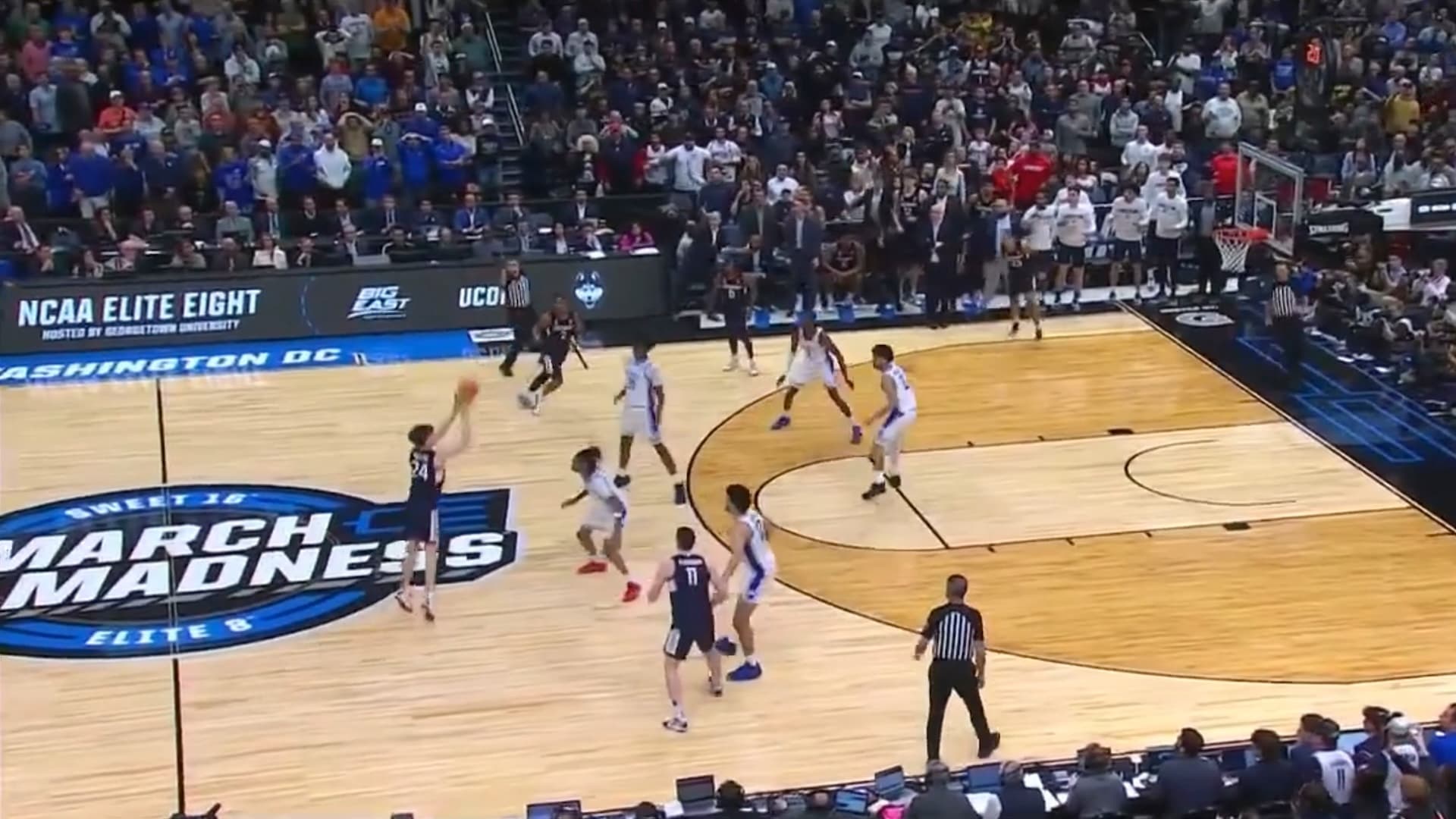 Fan notices unusual detail in photo of March Madness buzzer-beater shot
