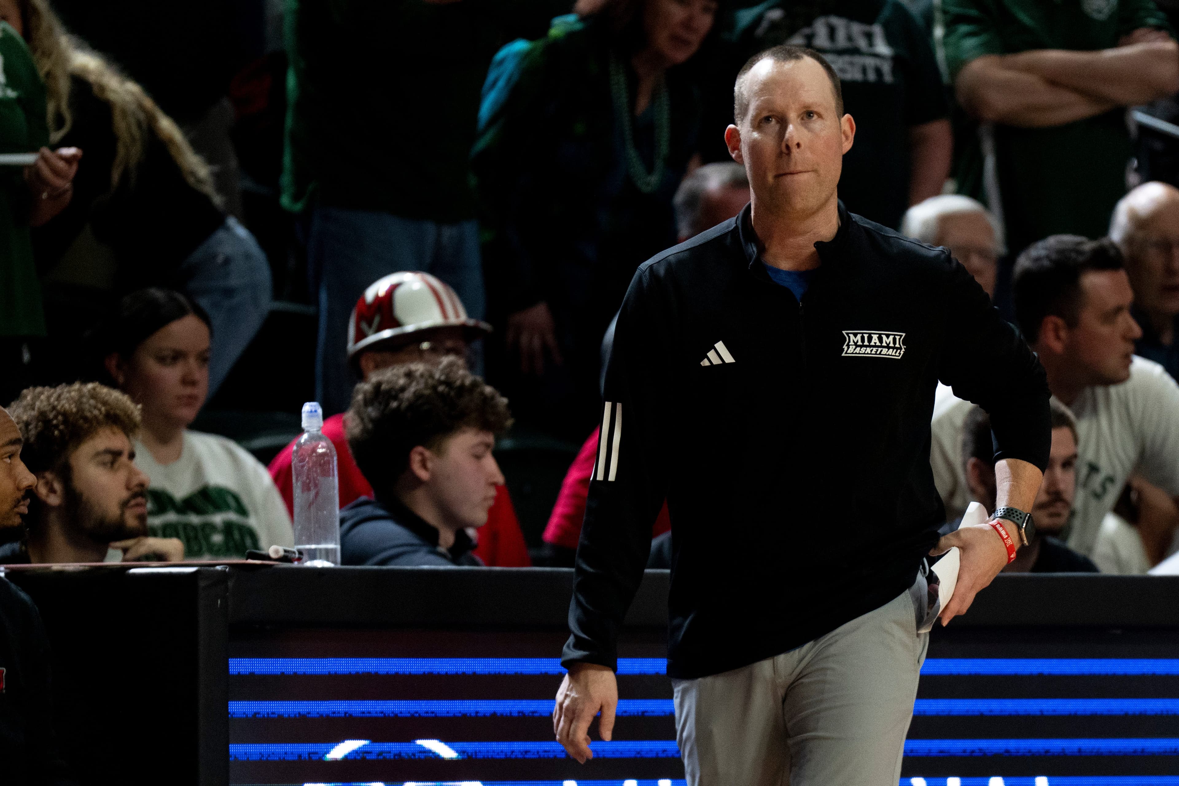 New Headline: "Former Coach in Hot Seat as NCAA Investigates Allegations of Bias