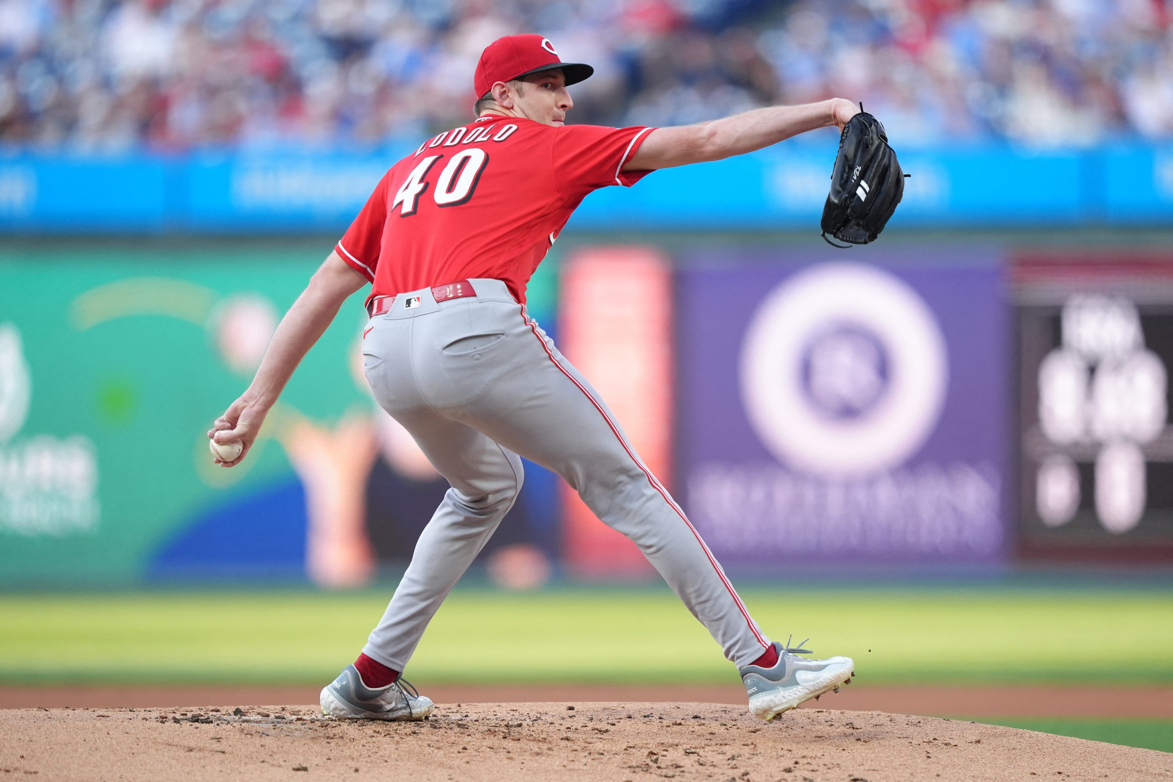 Reds' bullpen falters late in loss to surging Phillies.