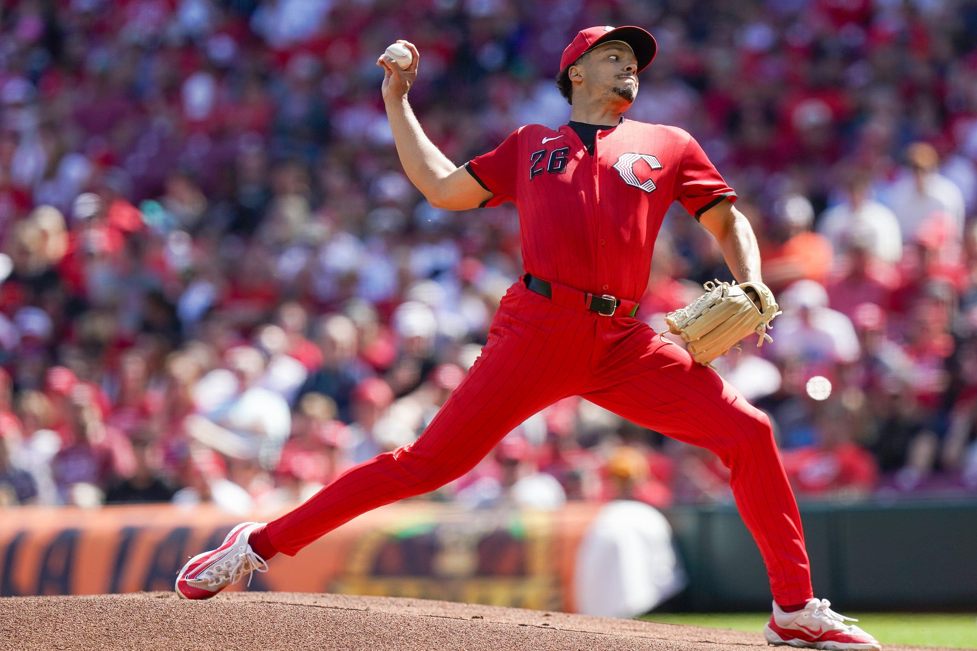 Reds take advantage of an Astros miscue to end losing streak