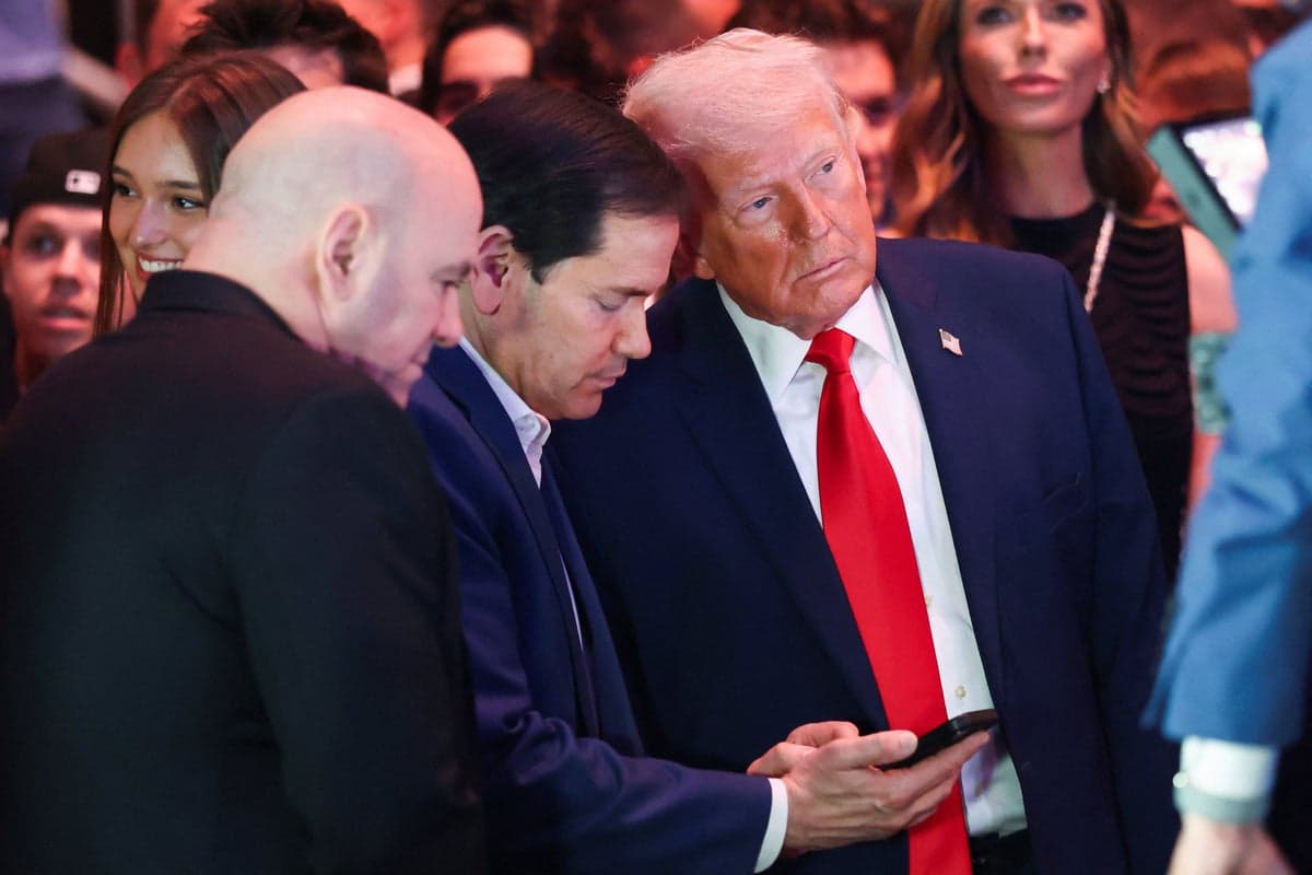 Trump all smiles at UFC 327 alongside Joe Rogan and Marco Rubio as Iran-US peace talks fail