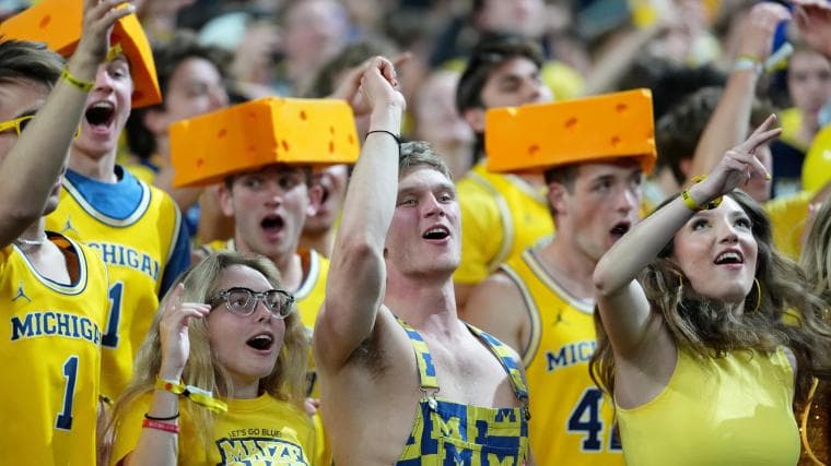 Why Michigan fans are wearing cheese heads during national championship game