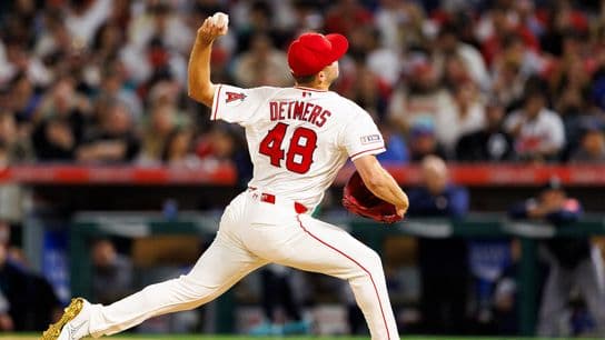 Angels drop pitchers' duel in extra innings in home opener