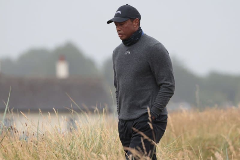 Tiger Woods arrested, charged with DUI after rollover crash