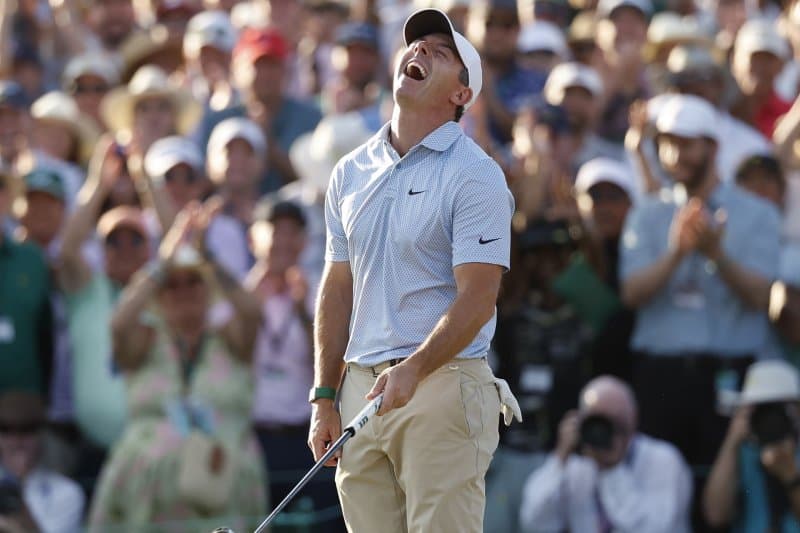 Rory McIlroy becomes first repeat Masters golf champion in 24 years
