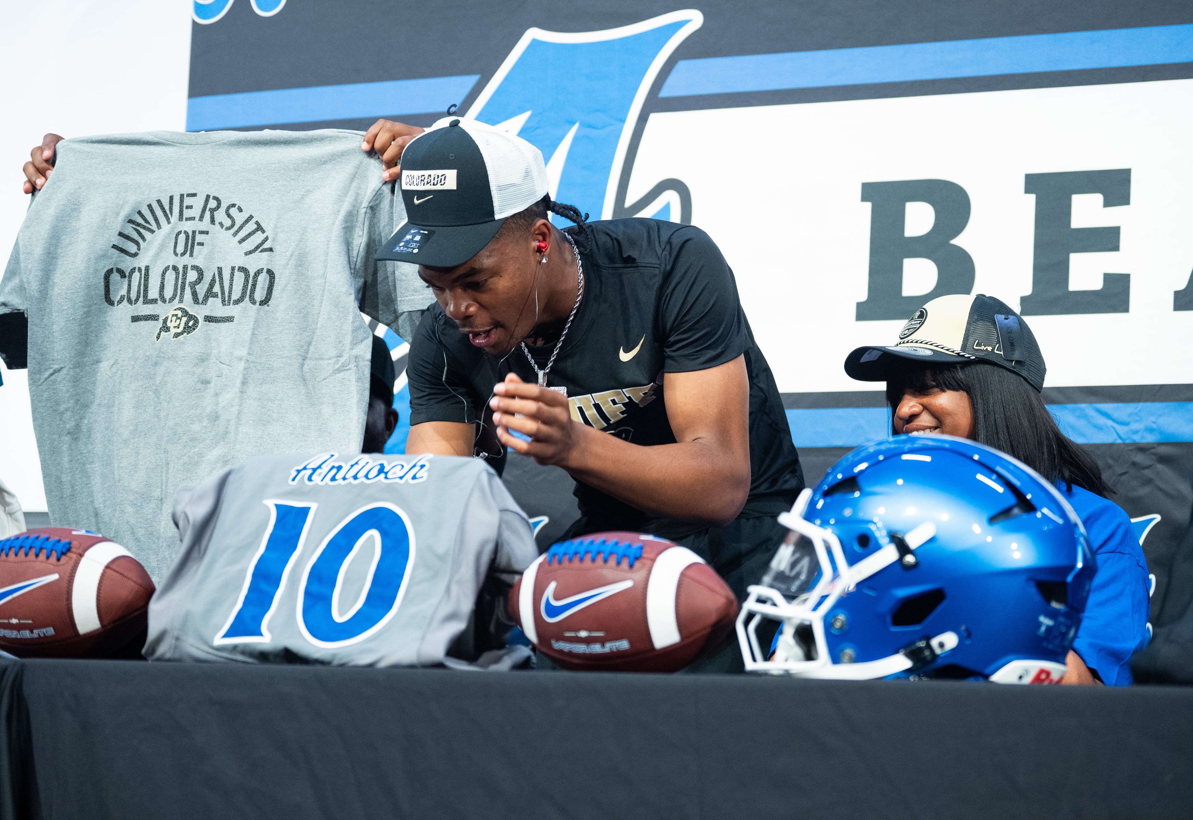 Others offered 'crazy' money, but Deion Sanders got his QB anyway. Here's how