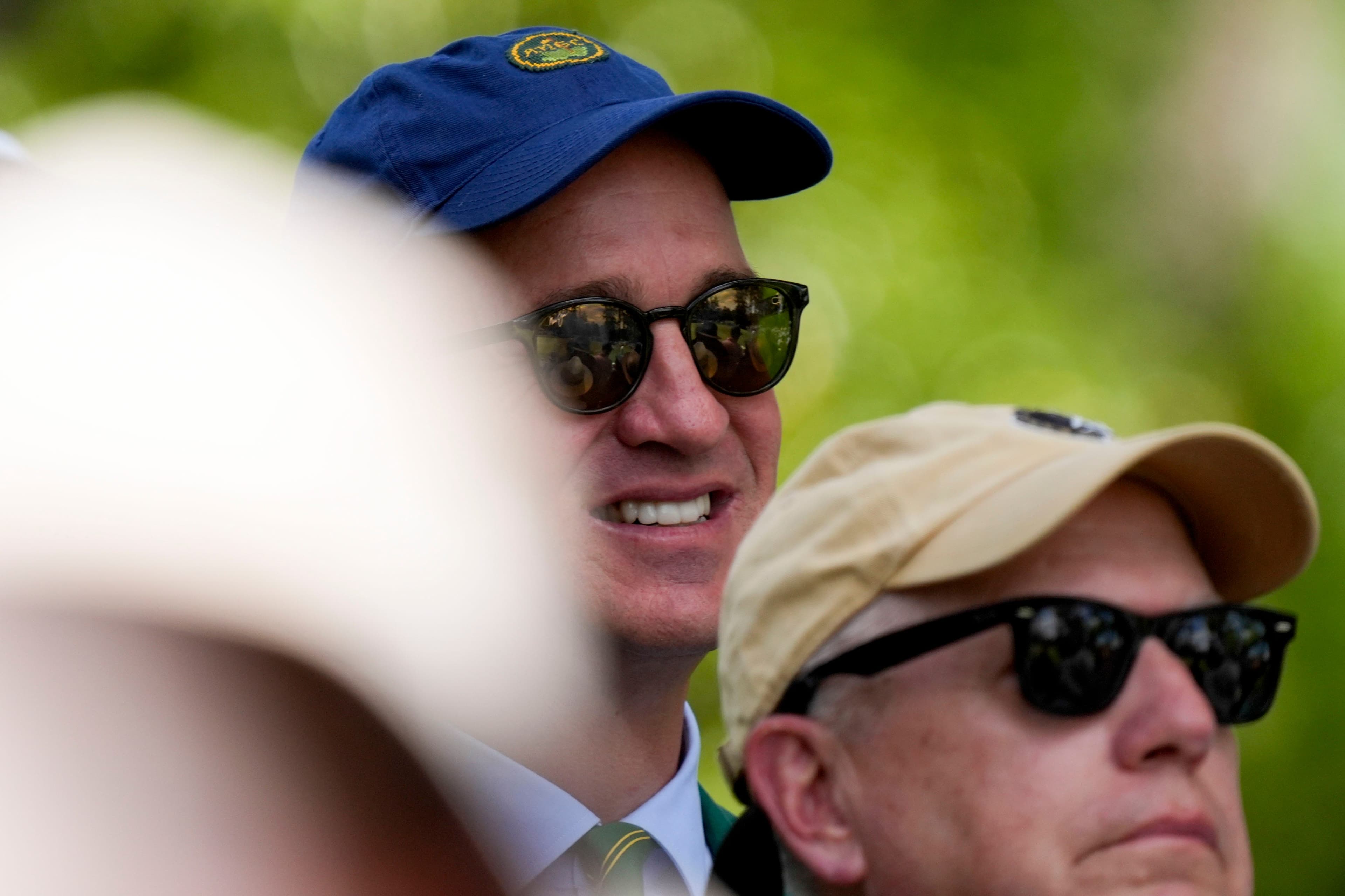 11 members of Augusta National with ties to pro, college football