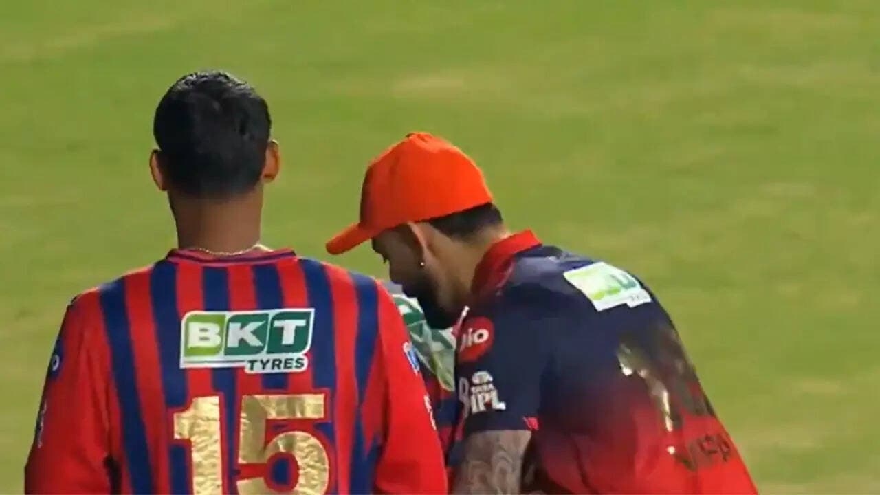 Touching moment: Virat Kohli stunned as LSG youngster tries to touch RCB batter's feet - Watch
