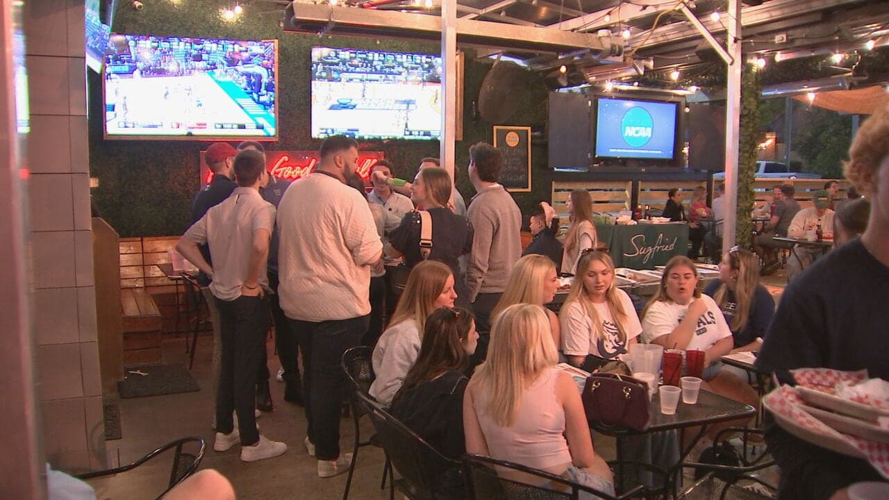 Fans show support despite loss as Queens University makes history