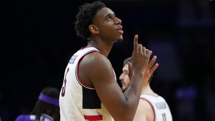 Reed's historic performance fuels UConn men's 82-71 March Madness win over Furman