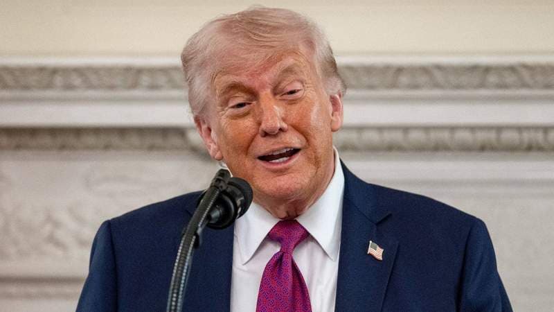 Trump photo with women’s tennis team sparks outrage