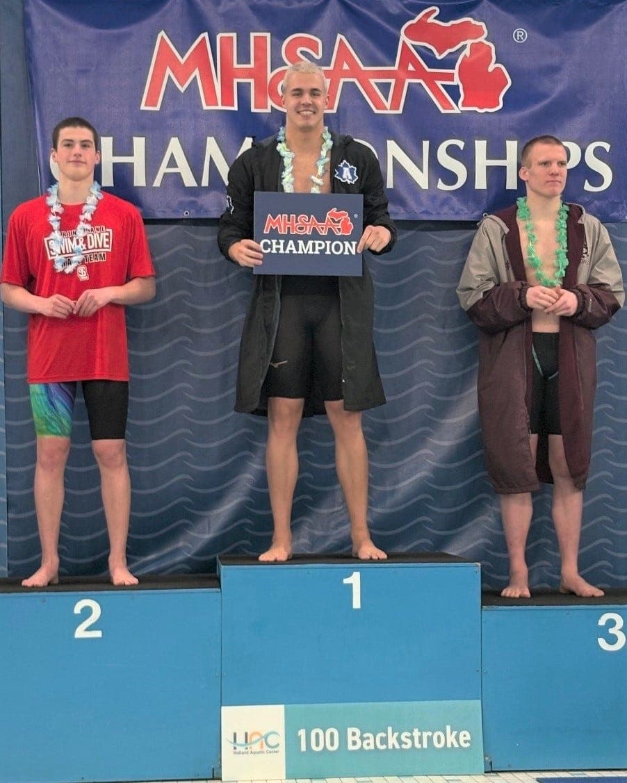 Adrian's Opsal overcomes injuries to secure backstroke state title