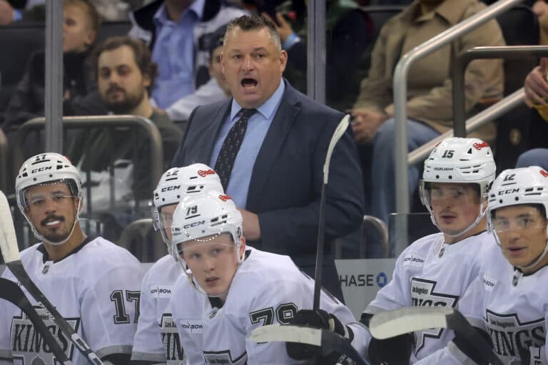 LA Kings coach D.J. Smith escapes injury after glass panel breaks