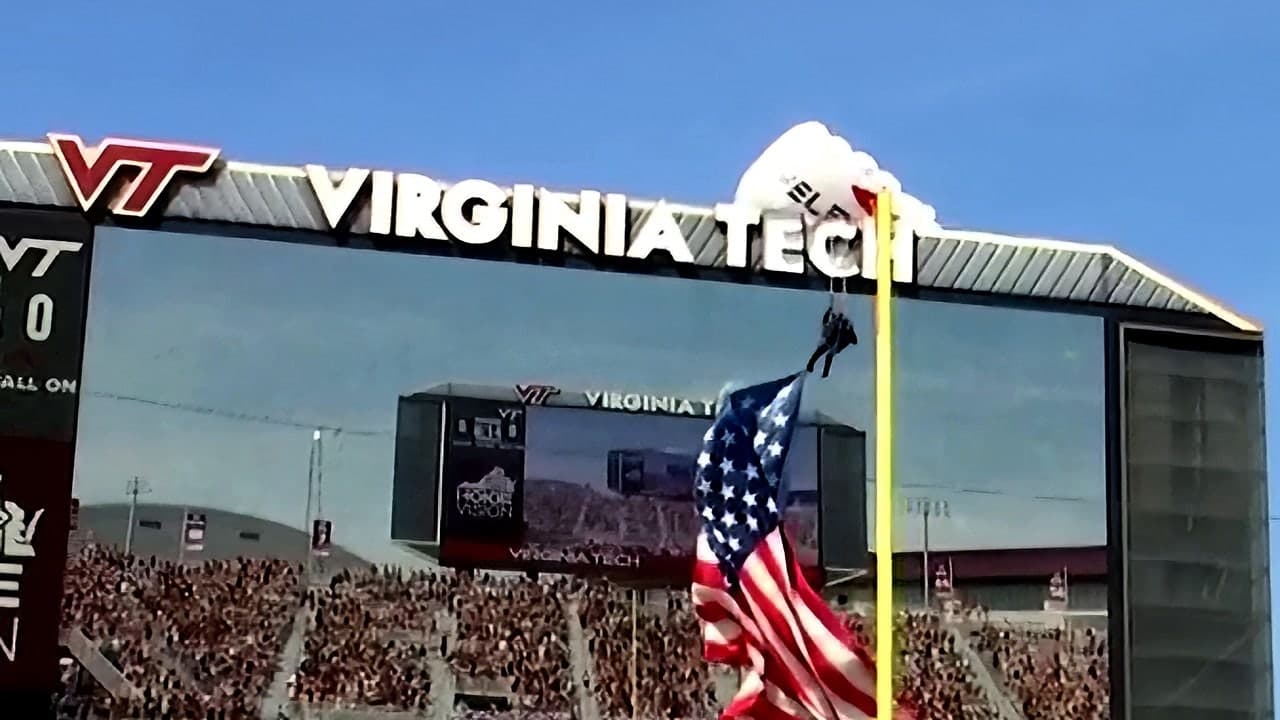 Skydiver who crashed into Virginia Tech scoreboard says jumbotron saved lives