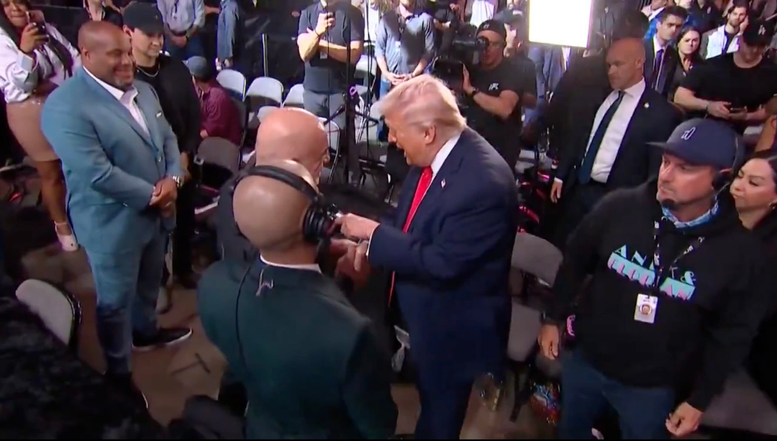 WATCH: Donald Trump Enters UFC 327 to Big Roar — Then Approaches Joe Rogan After Podcast Star Has Ripped Iran War